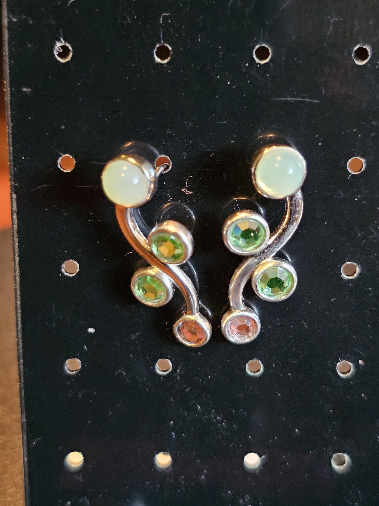 Uranium Glass Earrings in new Sterling Silver with Vintage round cut Uranium Glass stones in various sizes that glow under black/UV light