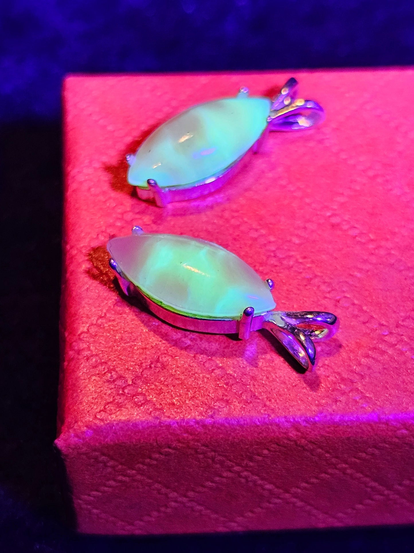 Bloody Uranium Glass Pendant in Sterling Silver with a vintage Marquee cut Uranium Glass stone glows under black / UV light