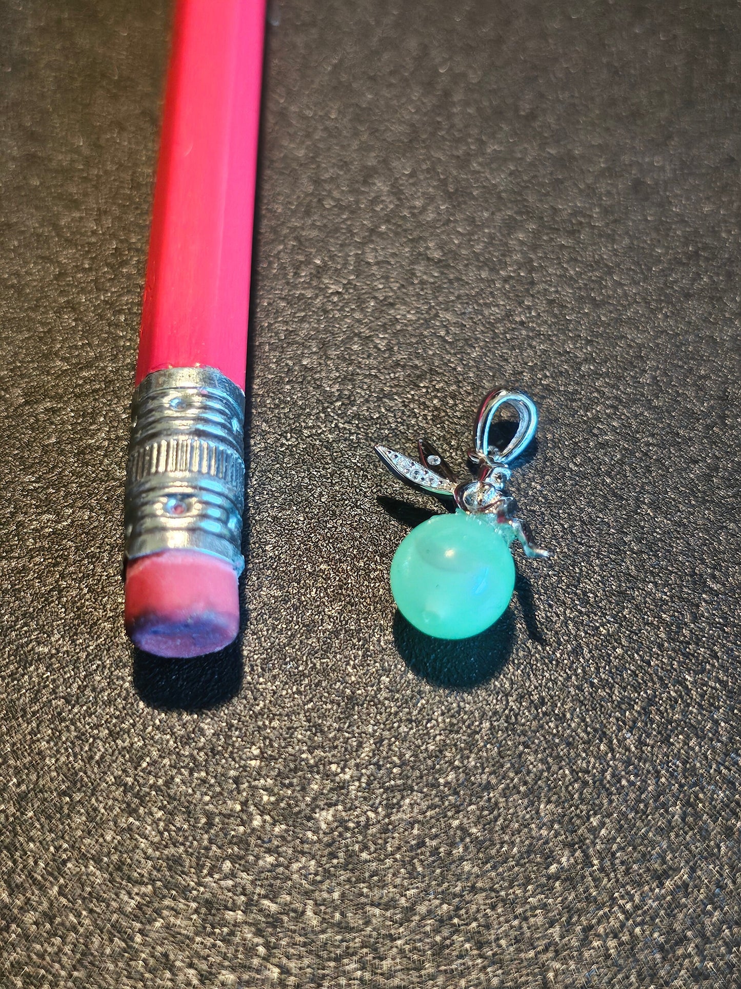 Uranium Glass Pendant in new Sterling Silver fairy design with a vintage 8 mm bead of Uranium Glass that glows under black / UV light