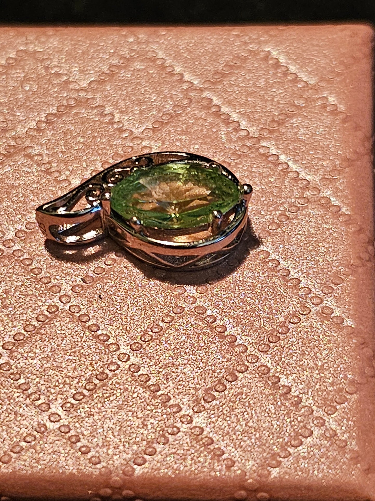 Uranium Glass Pendant in Sterling Silver with a vintage Marquee cut Uranium Glass stone glows under black / UV light