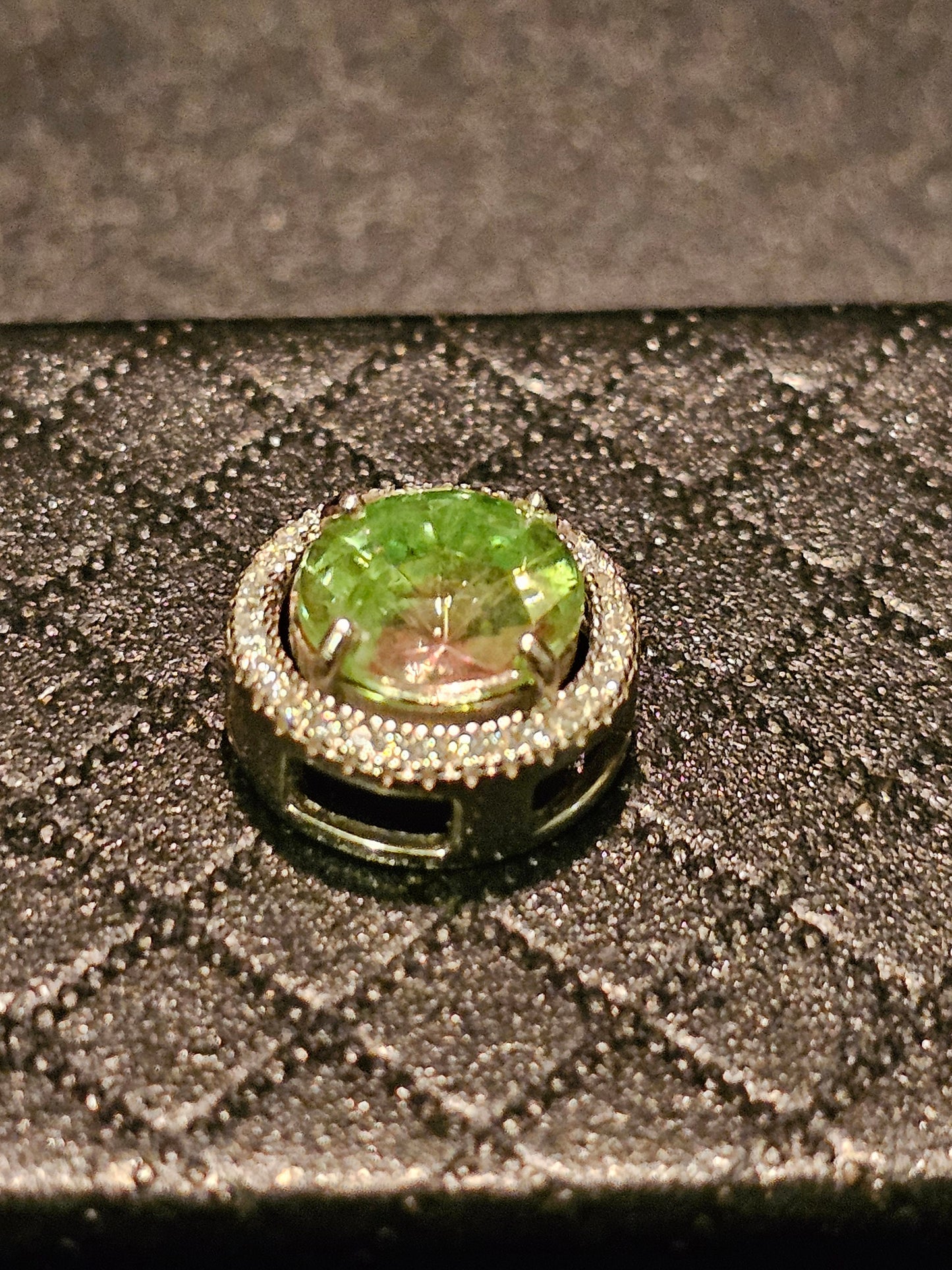 Uranium Glass Pendant in new Sterling Silver with a vintage 9 mm round cut Uranium Glass stone that glows under black / UV light