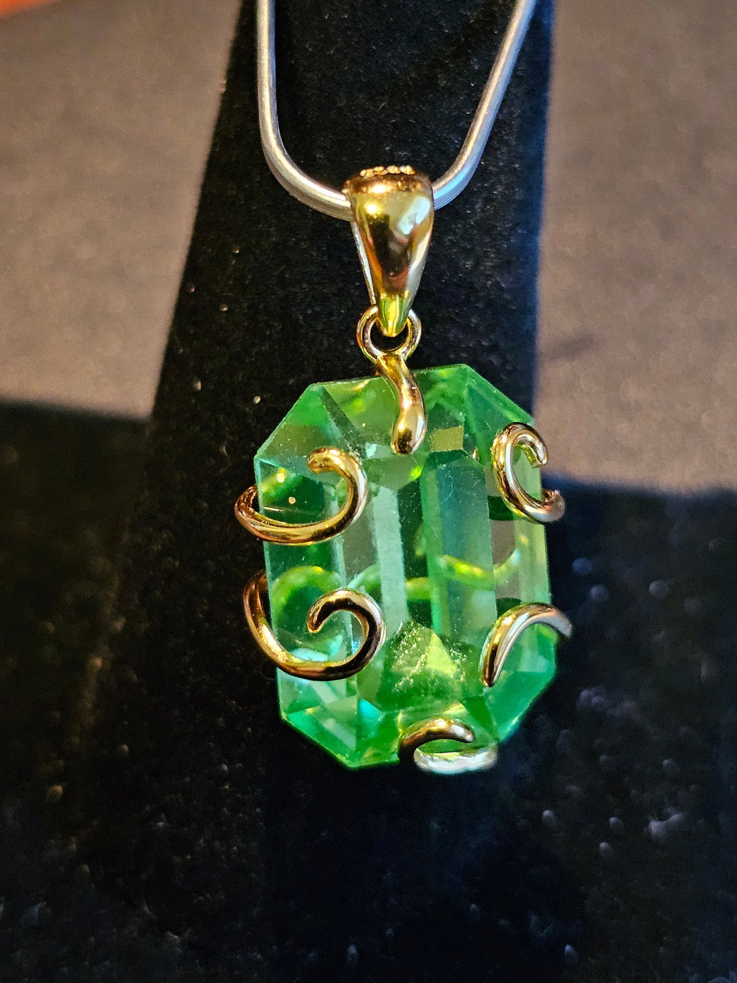 Uranium Glass Pendant in new Sterling Silver with a vintage Emerald cut 18x13 mm Uranium Glass stone glows under black / UV light