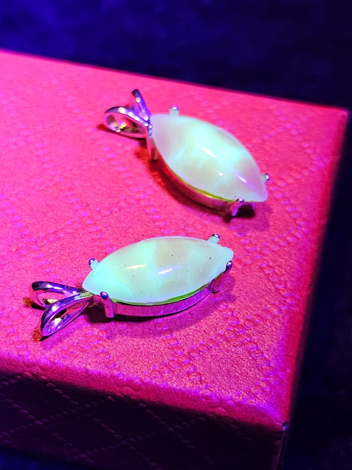 Bloody Uranium Glass Pendant in Sterling Silver with a vintage Marquee cut Uranium Glass stone glows under black / UV light