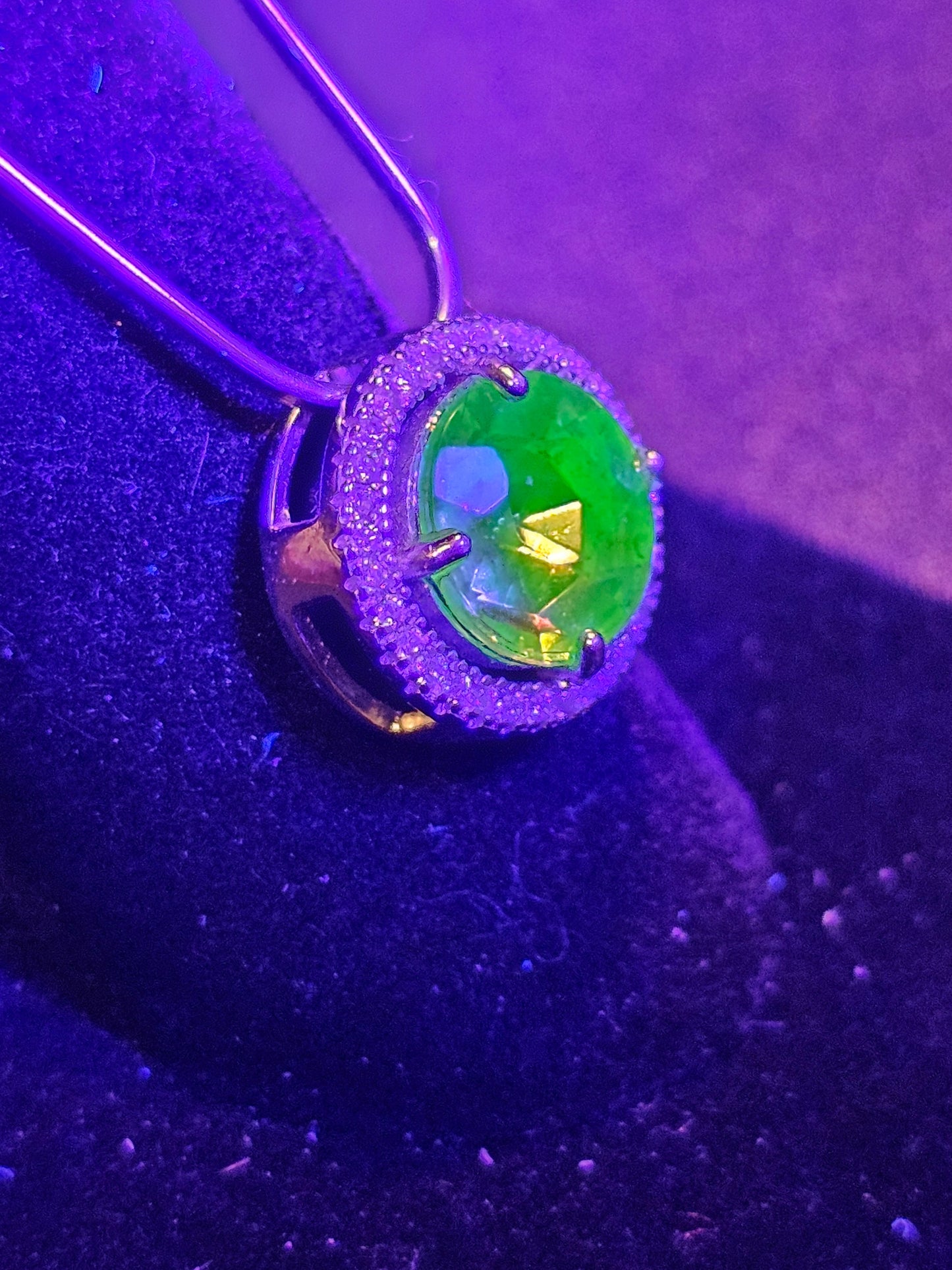 Uranium Glass Pendant in new Sterling Silver with a vintage 9 mm round cut Uranium Glass stone that glows under black / UV light