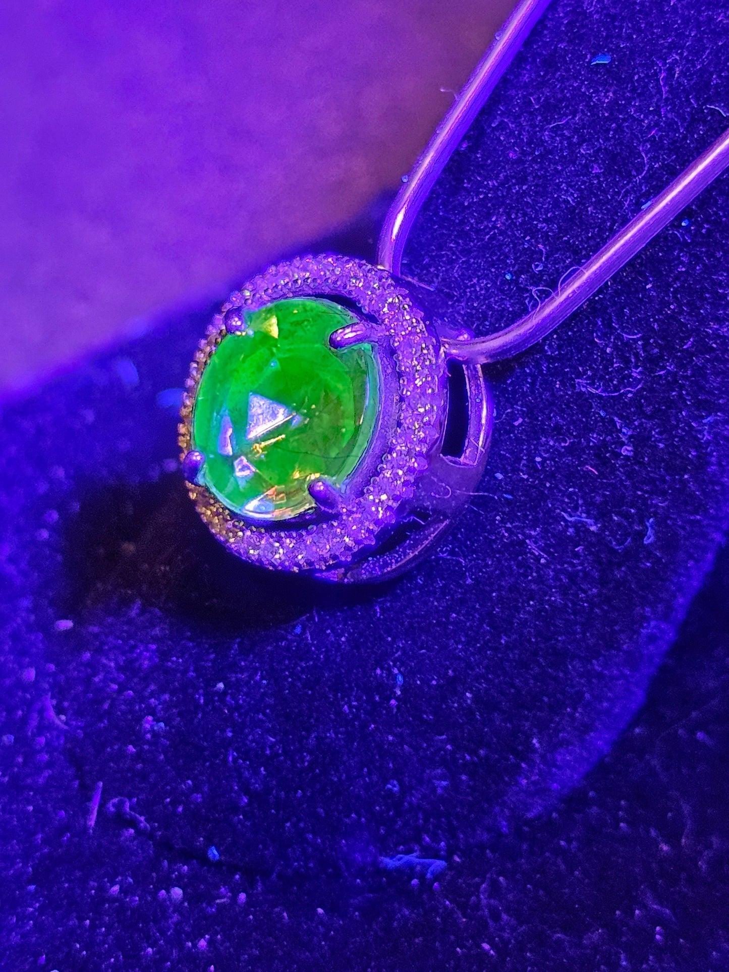 Uranium Glass Pendant in new Sterling Silver with a vintage 9 mm round cut Uranium Glass stone that glows under black / UV light