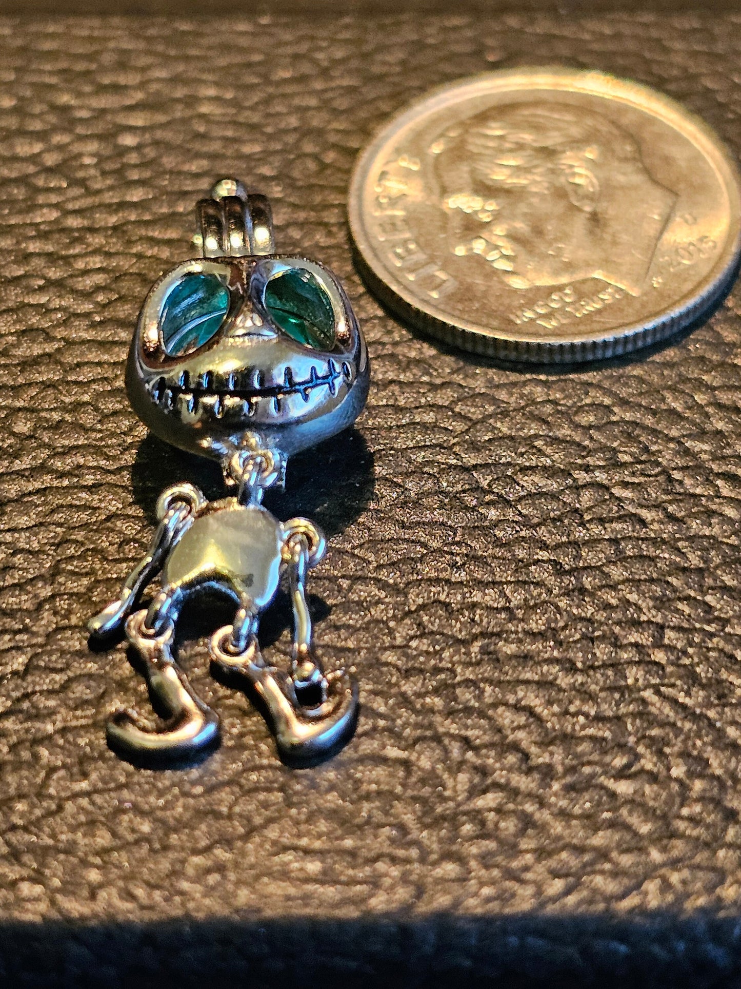 Uranium Glass Pendant new Sterling Silver pendant with a vintage Round cut Uranium Glass bead that glows under black / UV light