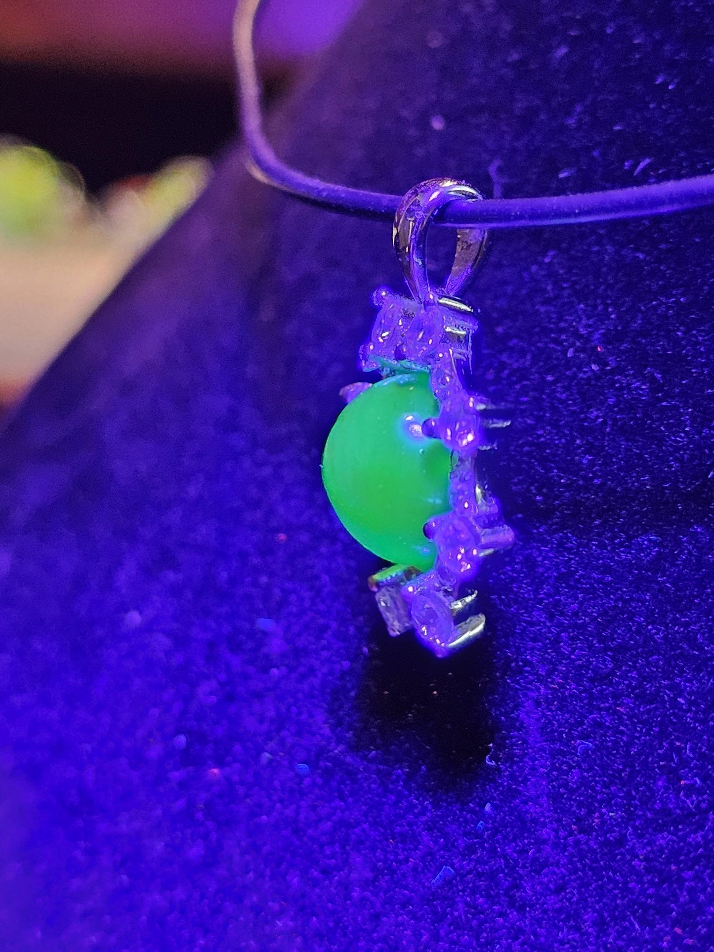 Uranium Glass pendant, with a vintage dark Green Round top Uranium glass stone that glows under black light mounted in new sterling silver