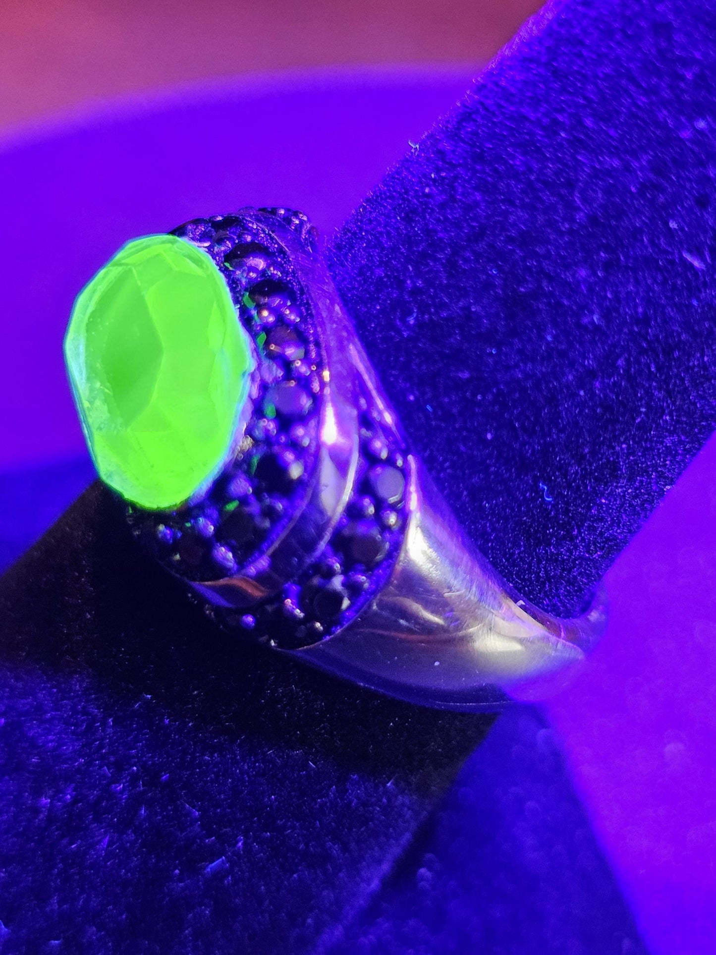 Uranium Glass Oval cut Ring with black Spindle accent stones, and a vintage Uranium glass 12x8 mm stone that glows under black / UV light