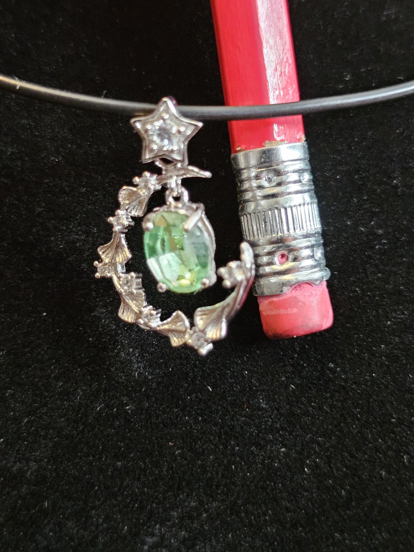 Uranium Glass Pendant in new Sterling Silver setting with a vintage 8x6 mm Oval cut Uranium Glass stone that glows under black / UV light