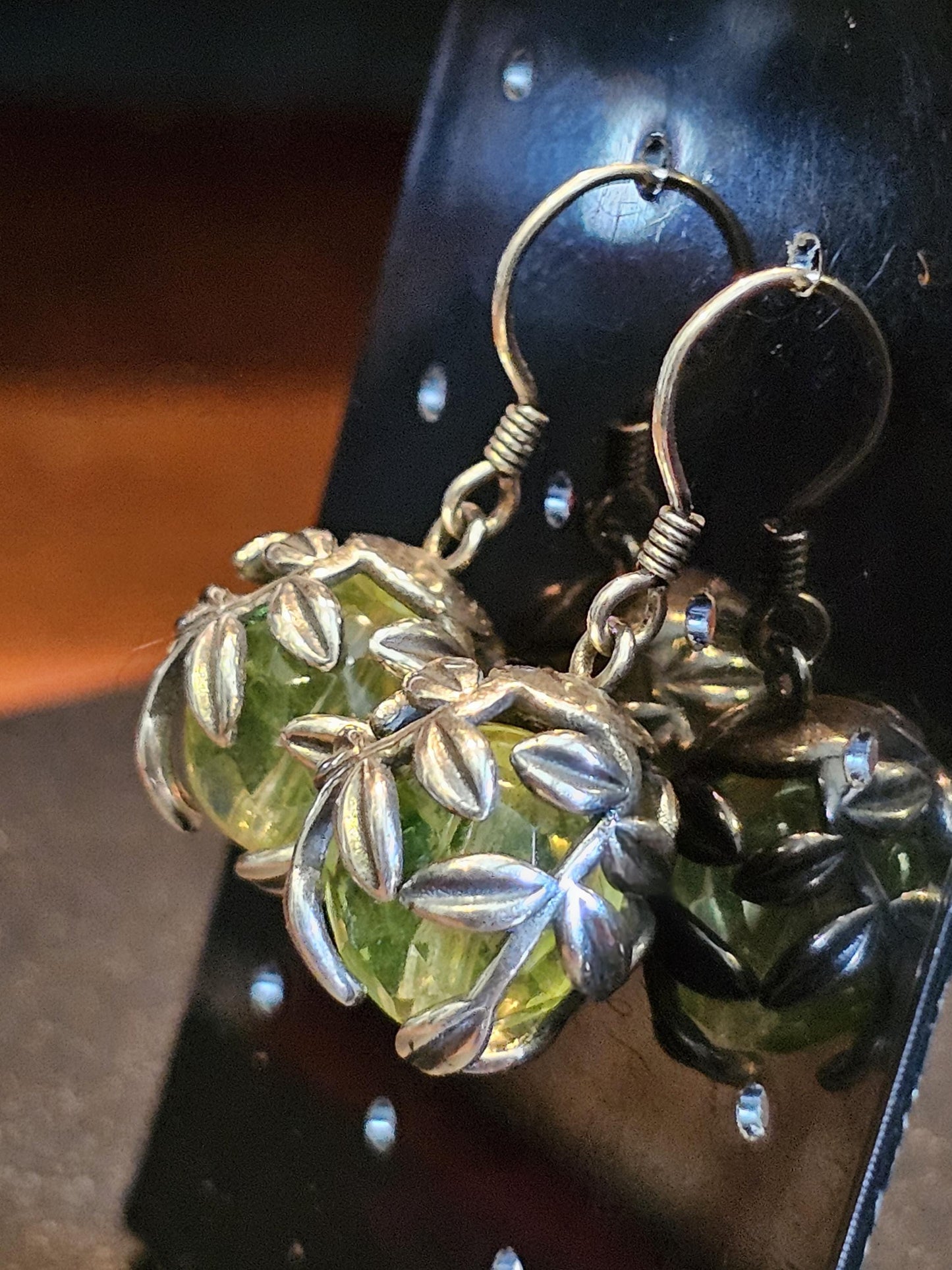 Uranium Glass Earrings in new Sterling Silver with a large vintage 12mm round cut Uranium Glass beads that glow under black / UV light