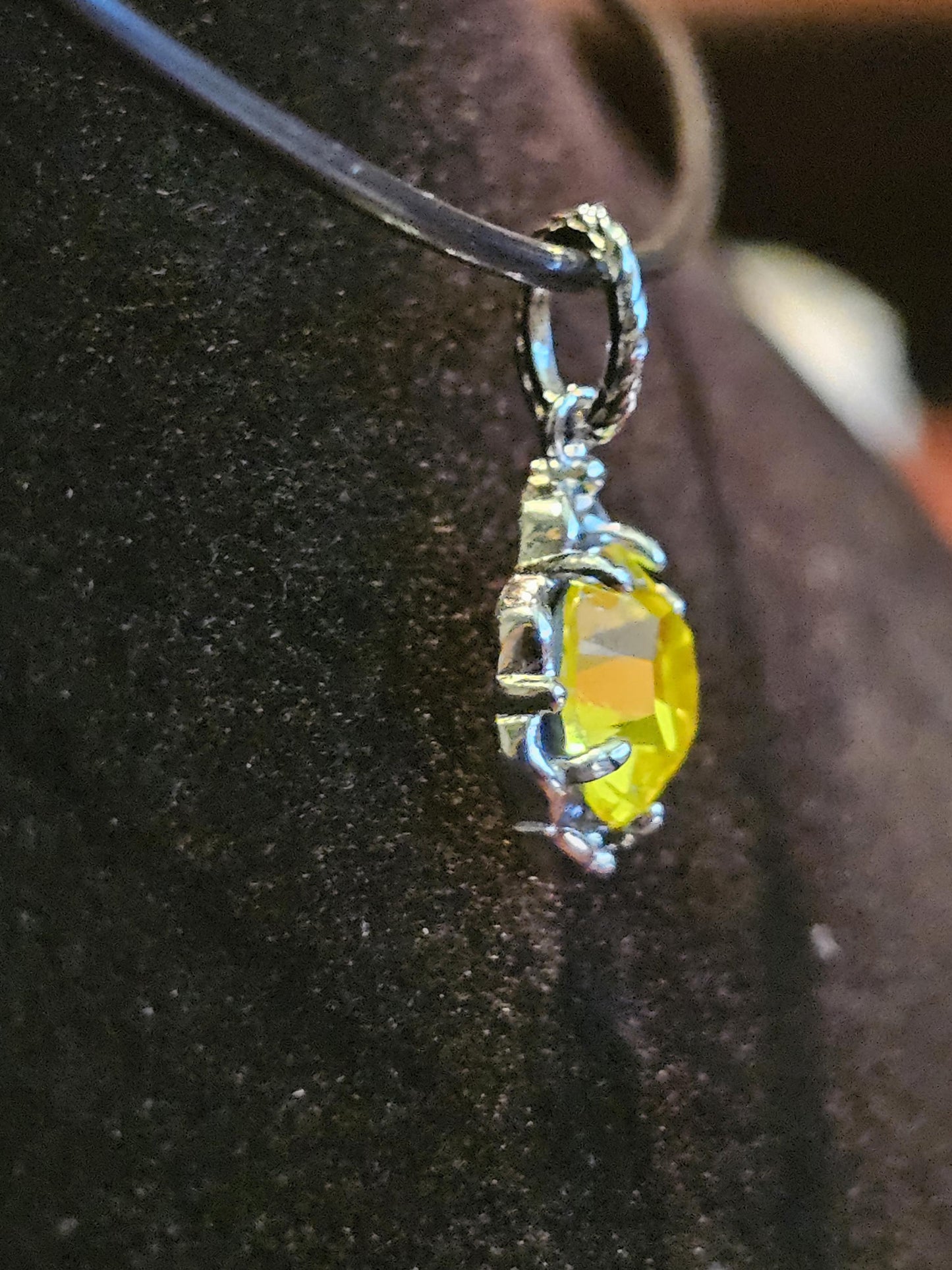 Cadmium Glass Pendant in new Sterling Silver with a vintage 8 mm Round cut Cadmium Glass stone that glows Orange under black / UV light