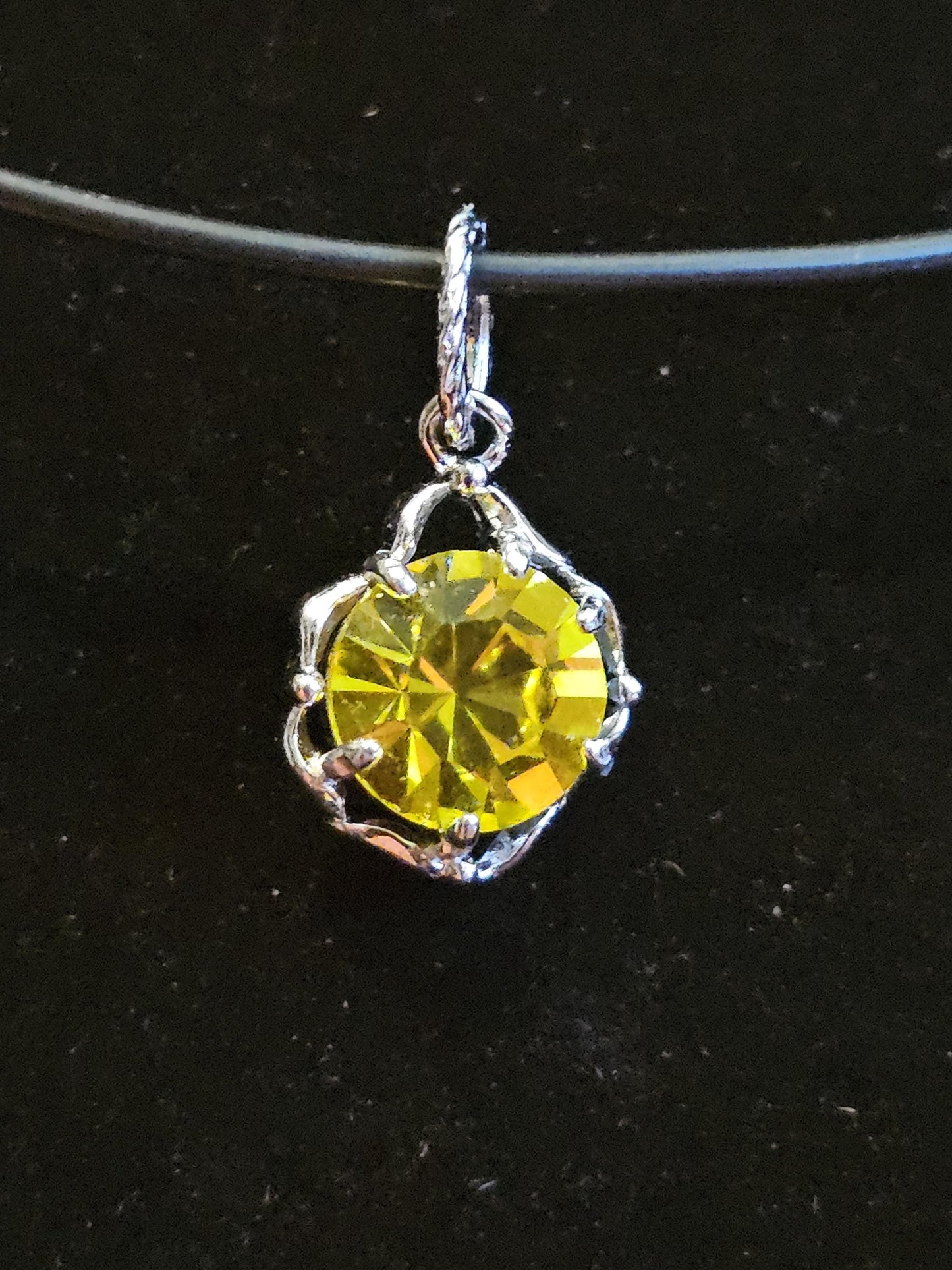Cadmium Glass Pendant in new Sterling Silver with a vintage 8 mm Round cut Cadmium Glass stone that glows Orange under black / UV light