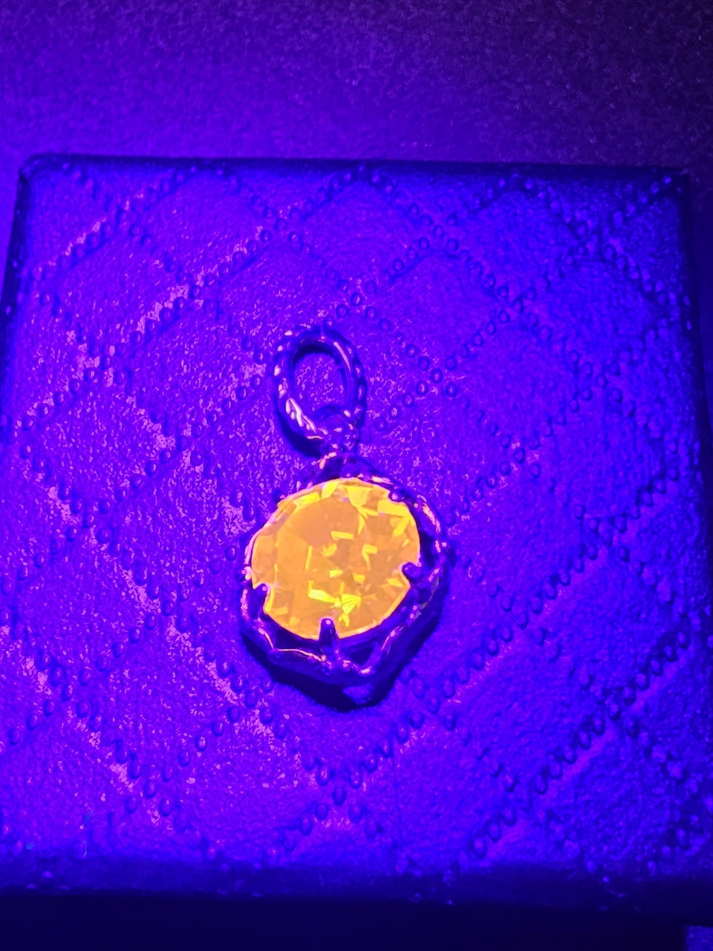 Cadmium Glass Pendant in new Sterling Silver with a vintage 8 mm Round cut Cadmium Glass stone that glows Orange under black / UV light