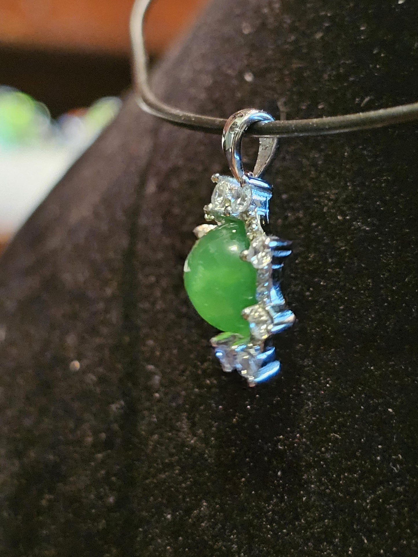 Uranium Glass pendant, with a vintage dark Green Round top Uranium glass stone that glows under black light mounted in new sterling silver