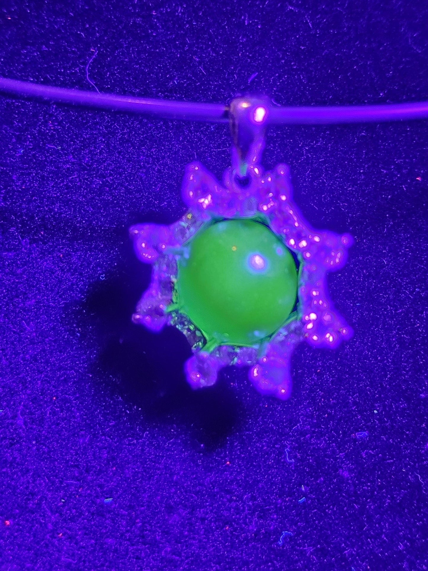 Uranium Glass pendant, with a vintage dark Green Round top Uranium glass stone that glows under black light mounted in new sterling silver