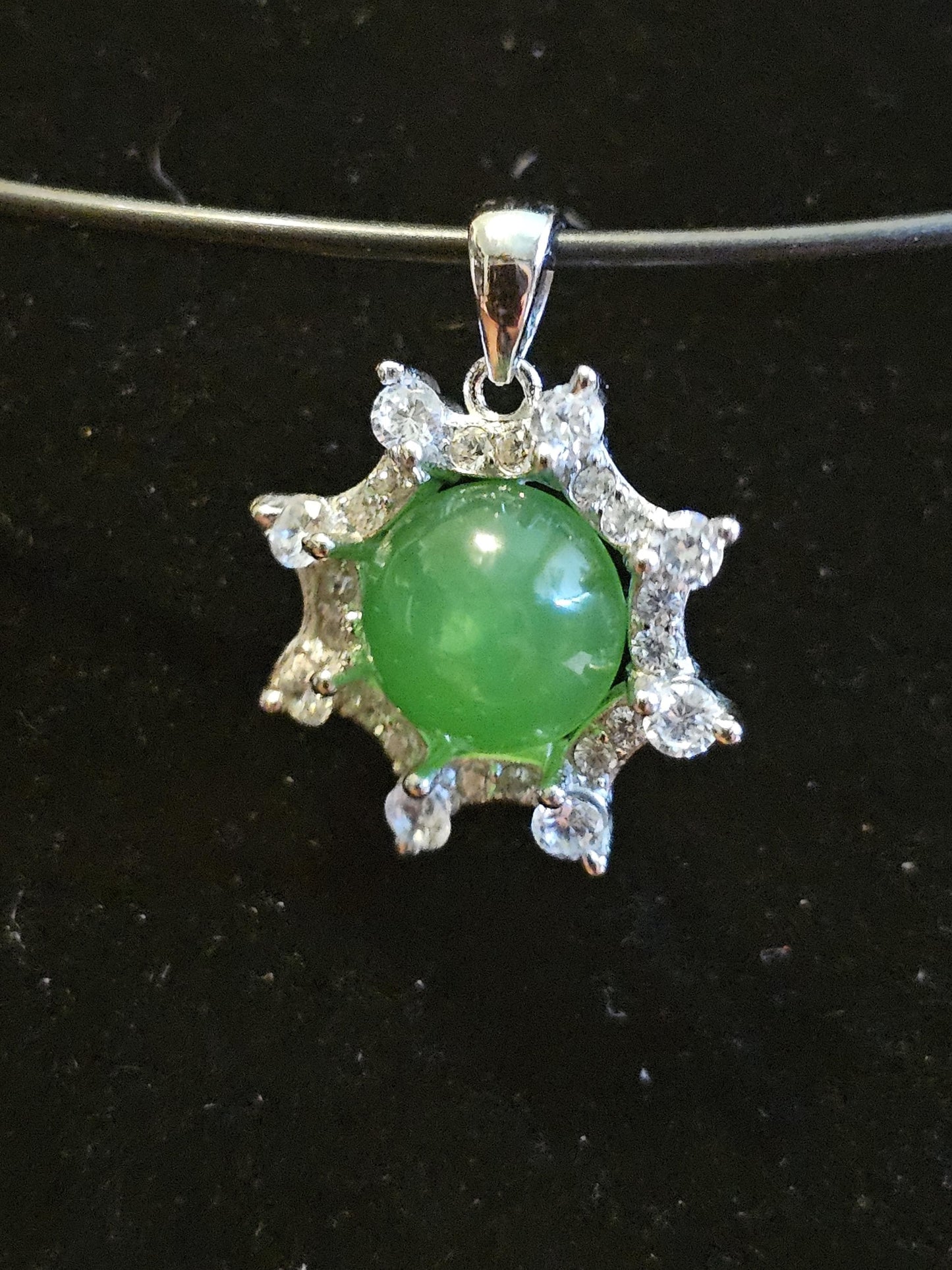 Uranium Glass pendant, with a vintage dark Green Round top Uranium glass stone that glows under black light mounted in new sterling silver