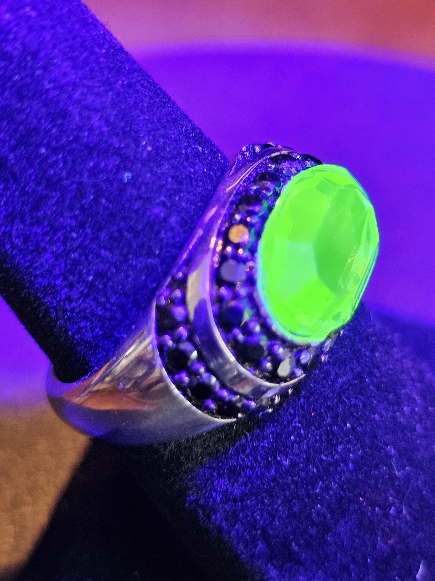 Uranium Glass Oval cut Ring with black Spindle accent stones, and a vintage Uranium glass 12x8 mm stone that glows under black / UV light