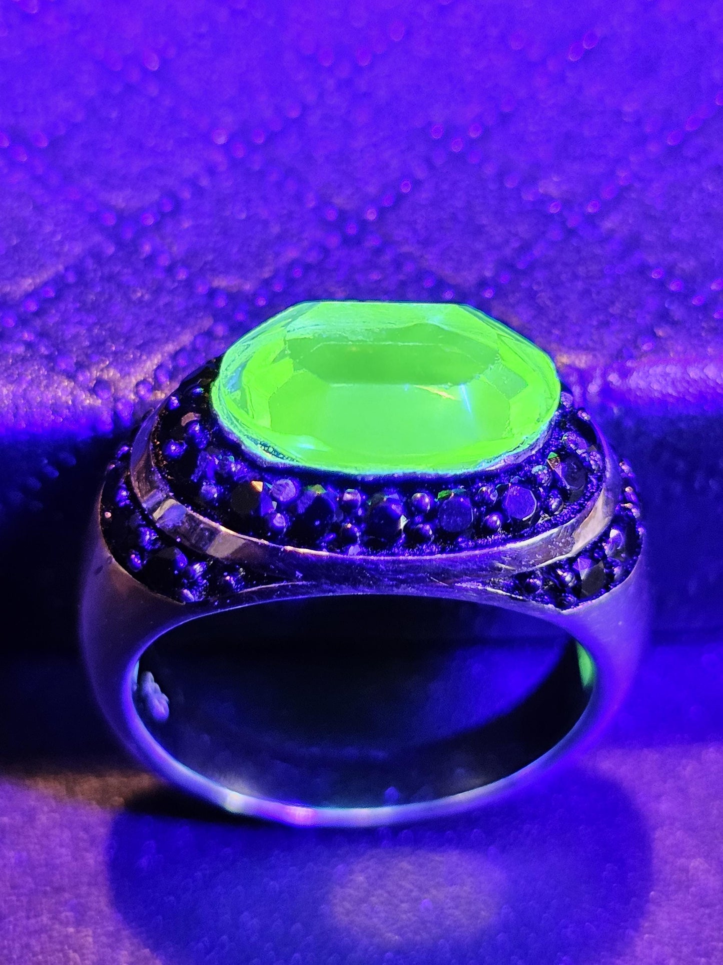 Uranium Glass Oval cut Ring with black Spindle accent stones, and a vintage Uranium glass 12x8 mm stone that glows under black / UV light