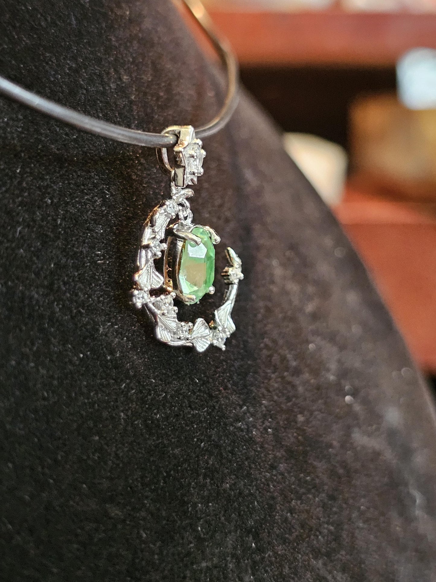 Uranium Glass Pendant in new Sterling Silver setting with a vintage 8x6 mm Oval cut Uranium Glass stone that glows under black / UV light