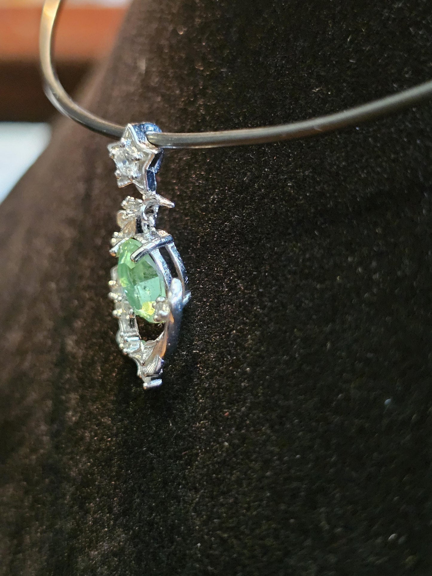 Uranium Glass Pendant in new Sterling Silver setting with a vintage 8x6 mm Oval cut Uranium Glass stone that glows under black / UV light