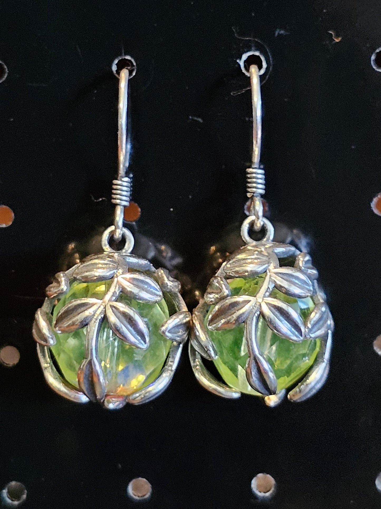 Uranium Glass Earrings in new Sterling Silver with a large vintage 12mm round cut Uranium Glass beads that glow under black / UV light