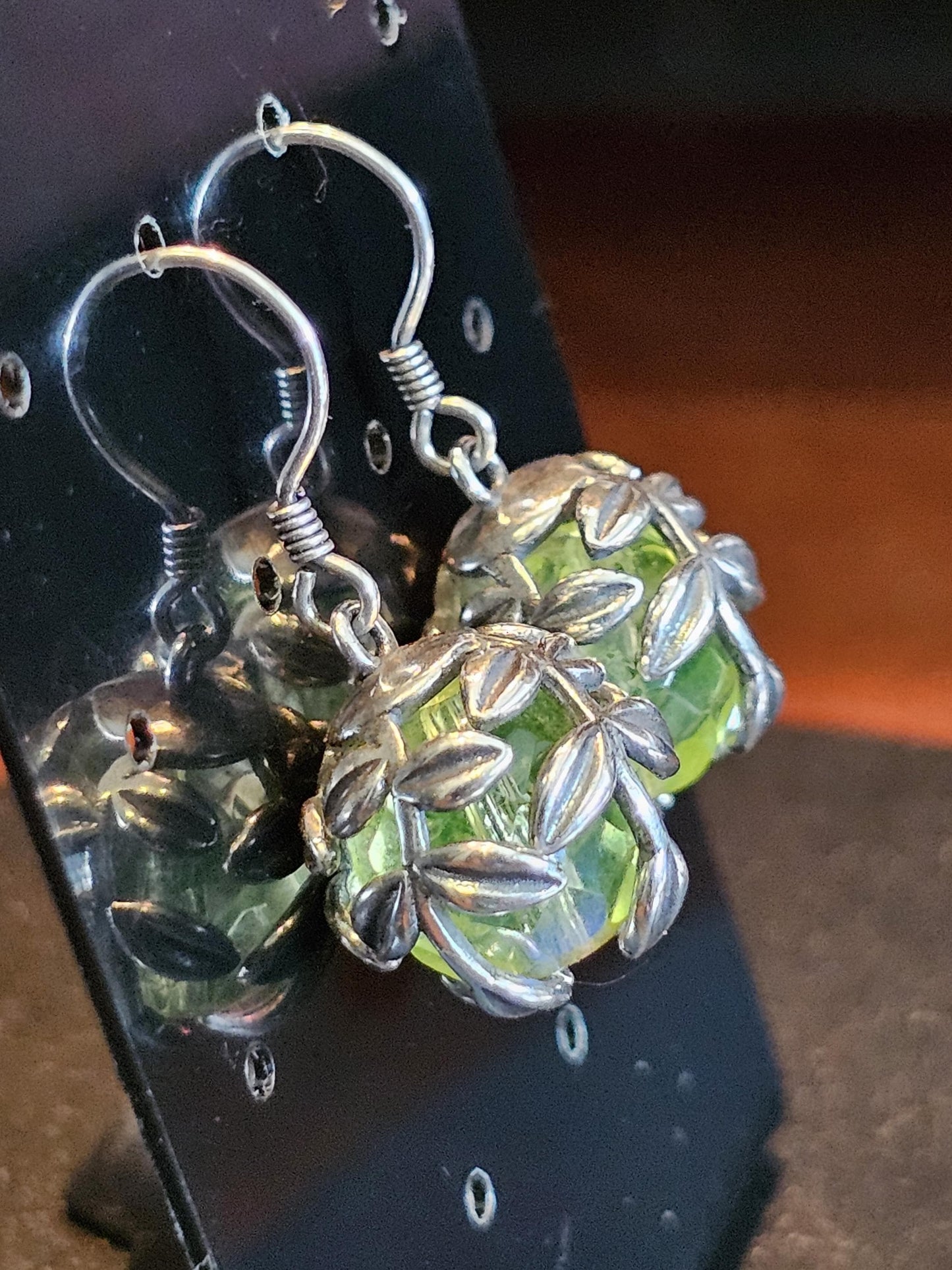 Uranium Glass Earrings in new Sterling Silver with a large vintage 12mm round cut Uranium Glass beads that glow under black / UV light