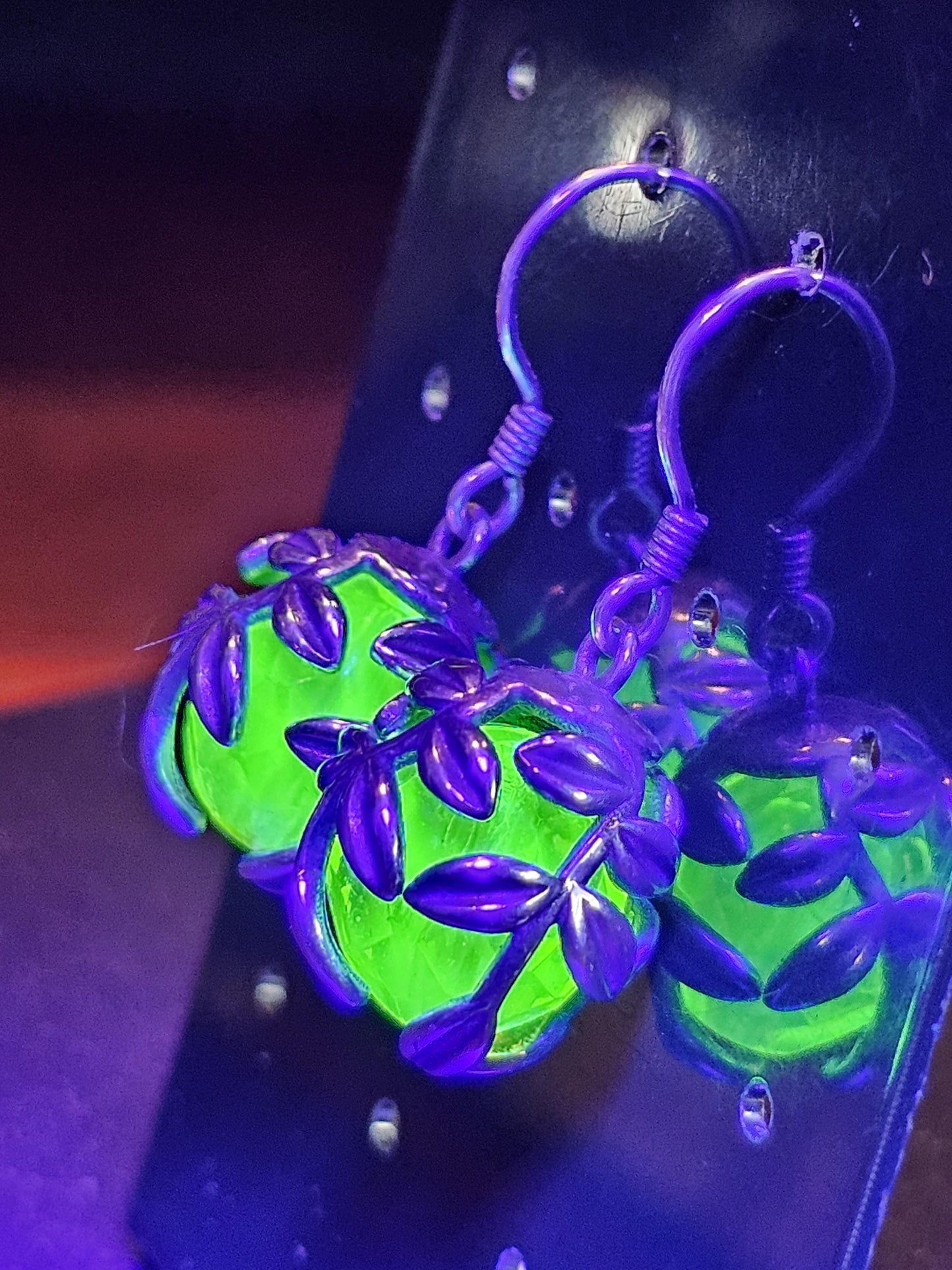Uranium Glass Earrings in new Sterling Silver with a large vintage 12mm round cut Uranium Glass beads that glow under black / UV light