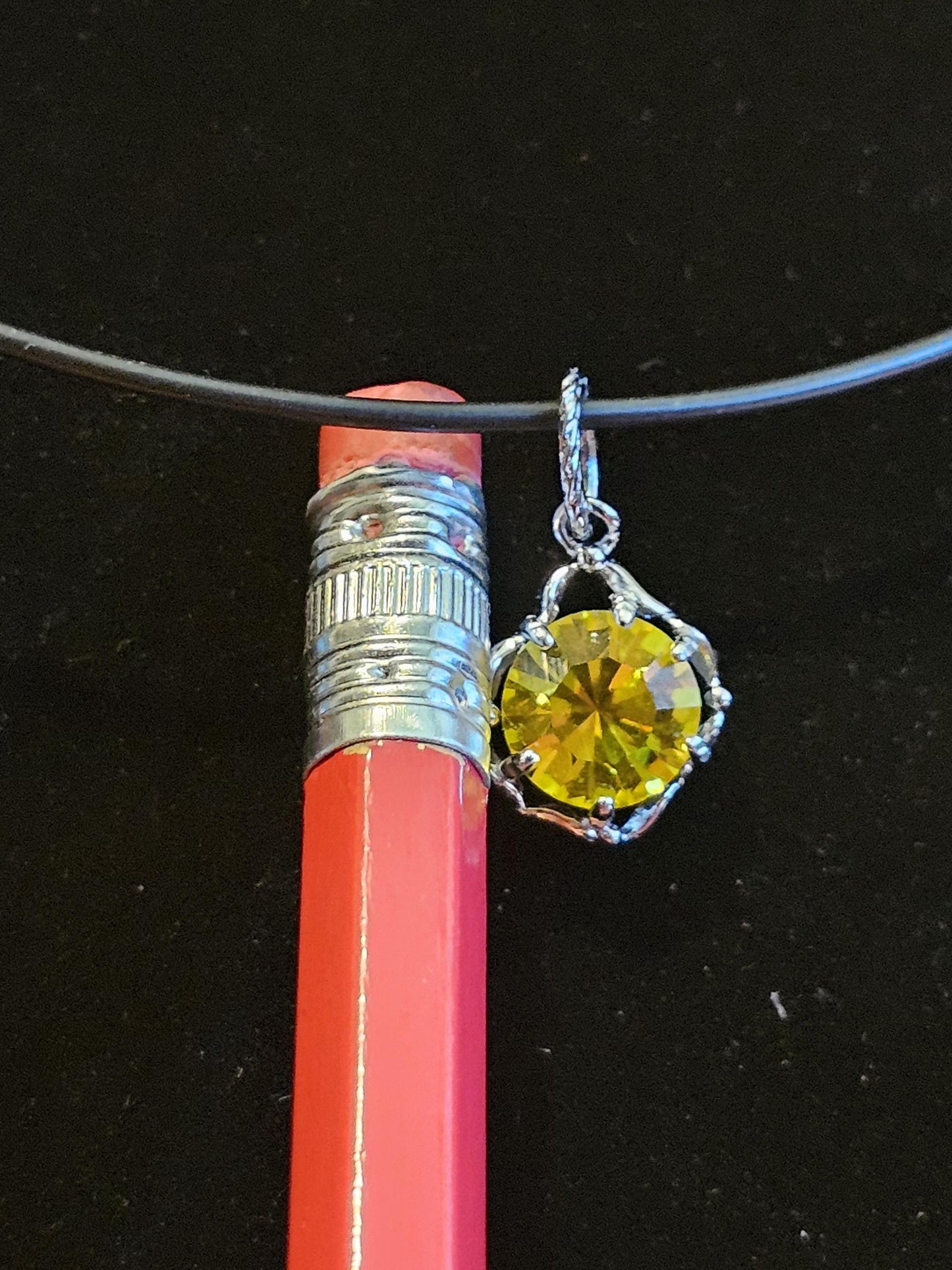 Cadmium Glass Pendant in new Sterling Silver with a vintage 8 mm Round cut Cadmium Glass stone that glows Orange under black / UV light