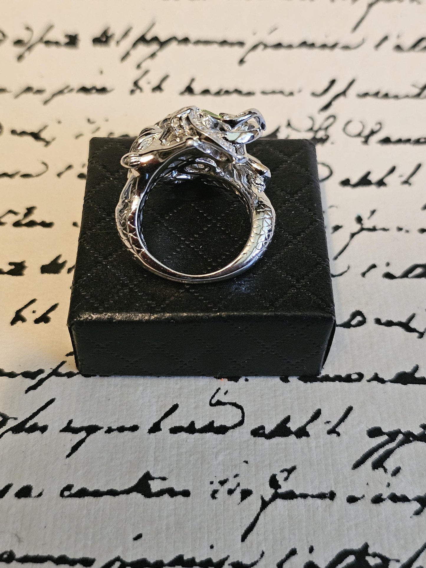 Uranium Glass Round cut Ring size 7 new Abstract style Sterling Silver with a vintage Uranium glass stone that glows under black / UV light