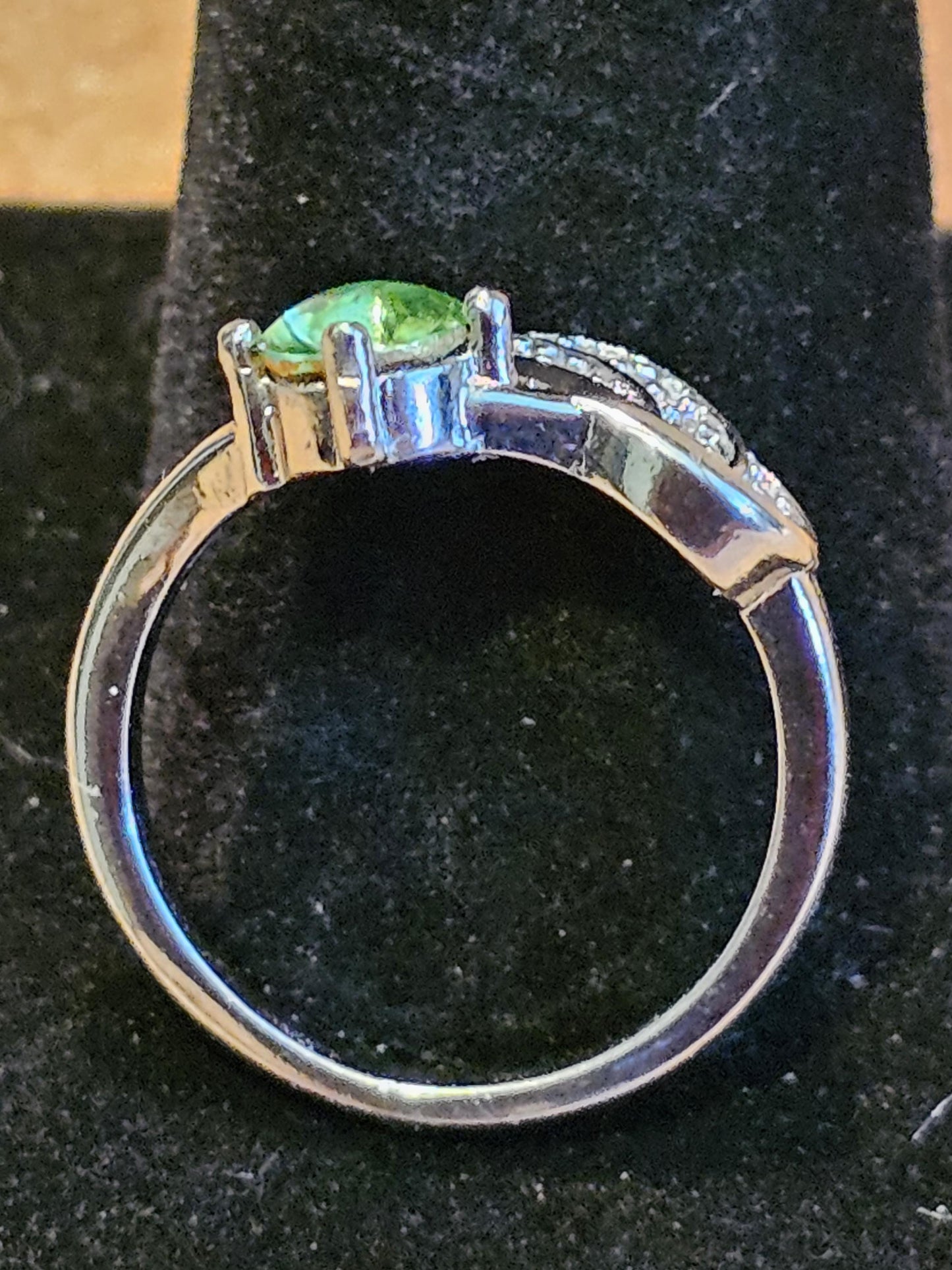 Uranium Glass Round cut Ring in size 6. New Silver plated with a vintage 5mm Uranium glass stone that glows under black/UV light