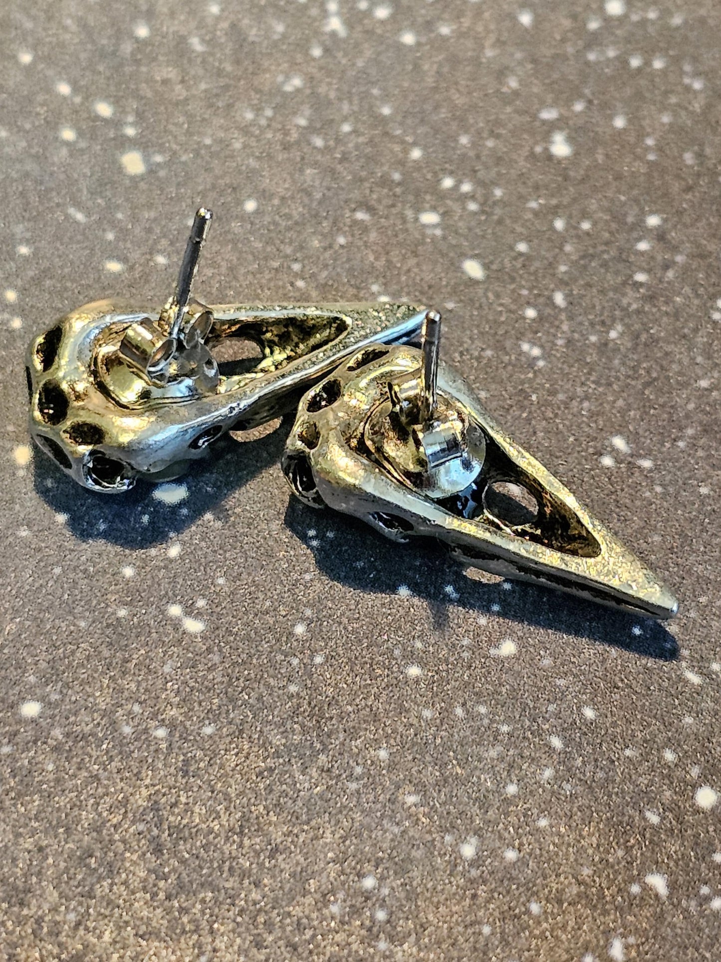 Uranium Glass Earrings Raven skull design with Sterling Silver posts. Vintage Round Uranium Glass Beads that glow under black/UV light