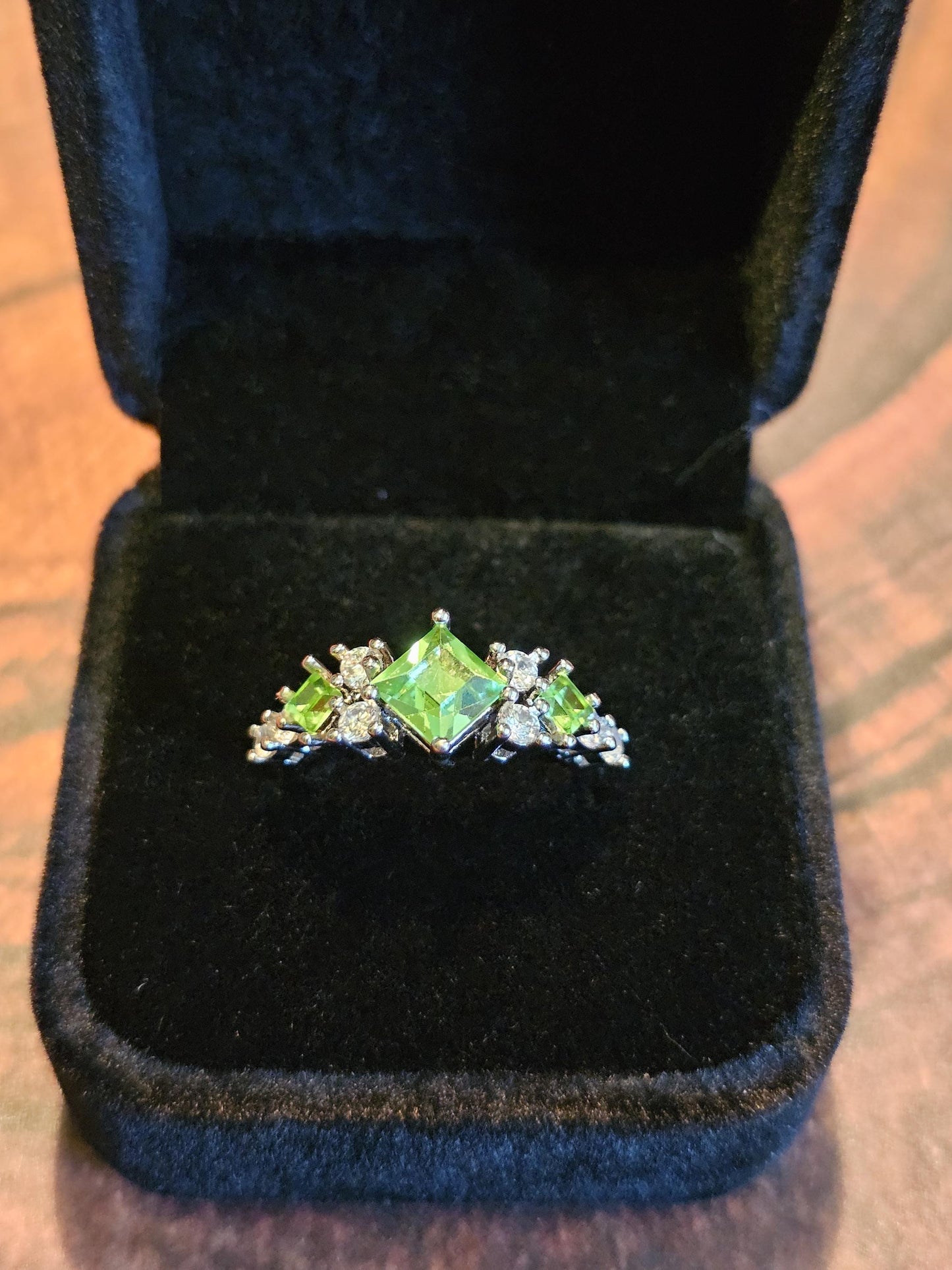 Uranium Glass Ring Princess cut 8 accent stones and 3 vintage Uranium glass stones that glow under black/UV light. Sterling Silver size 7