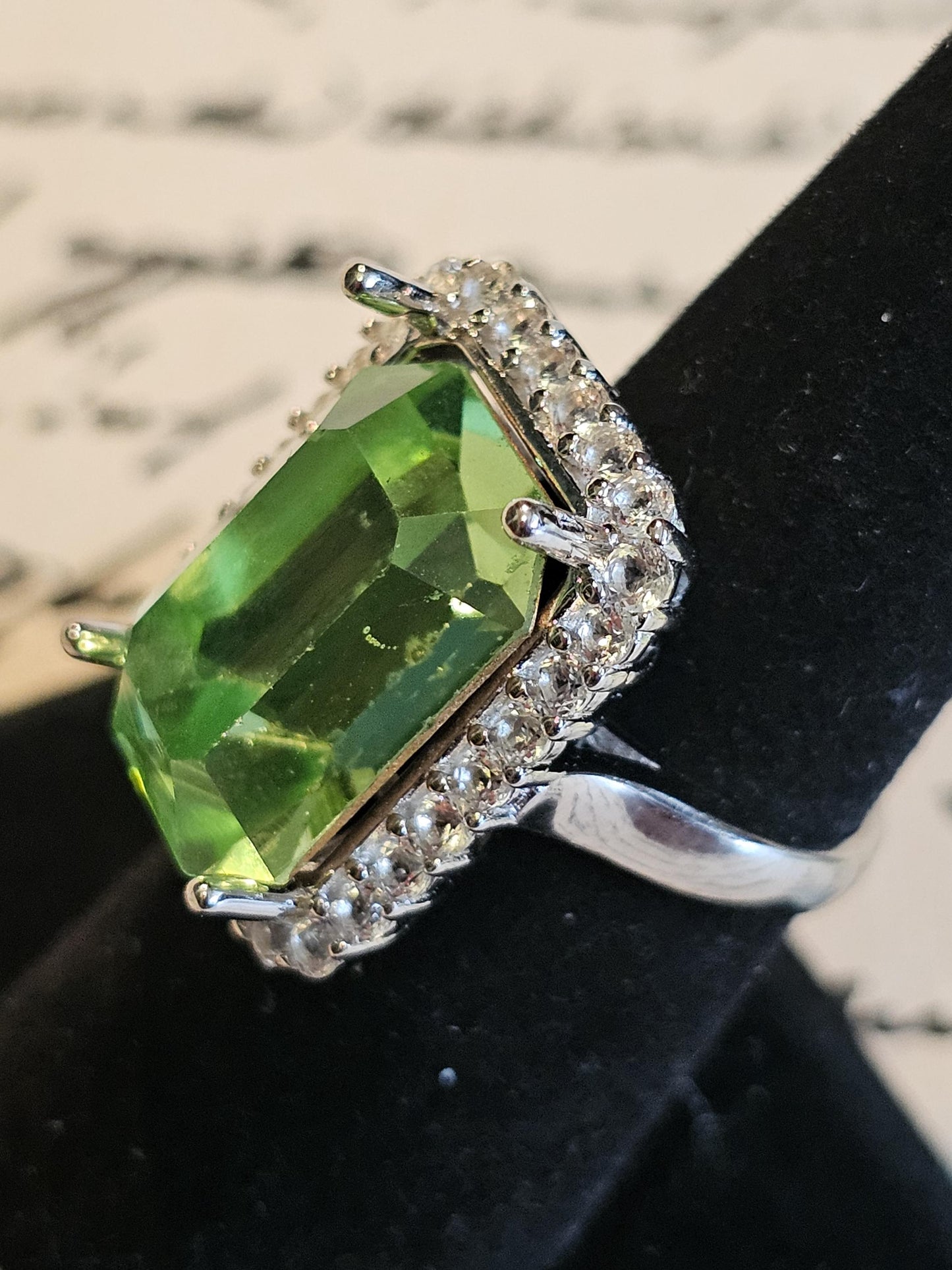 Uranium Glass Emerald cut Halo style ring in size 7, new Sterling Silver with vintage Uranium glass stone that glows under black / UV light