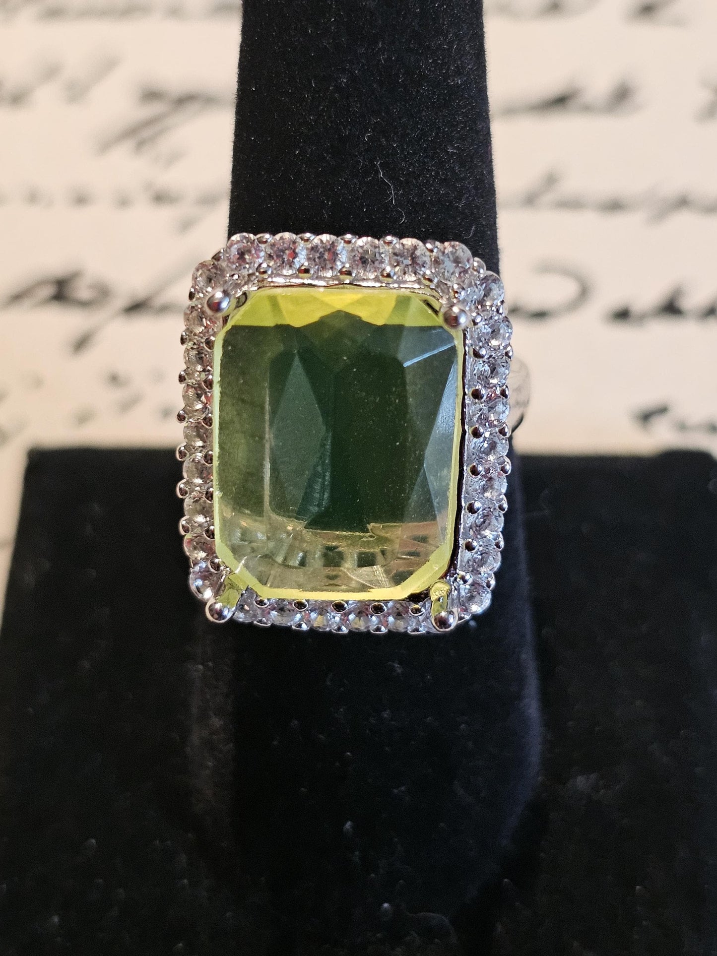 Uranium Glass Emerald cut Halo style ring in size 7, new Sterling Silver with vintage Uranium glass stone that glows under black / UV light