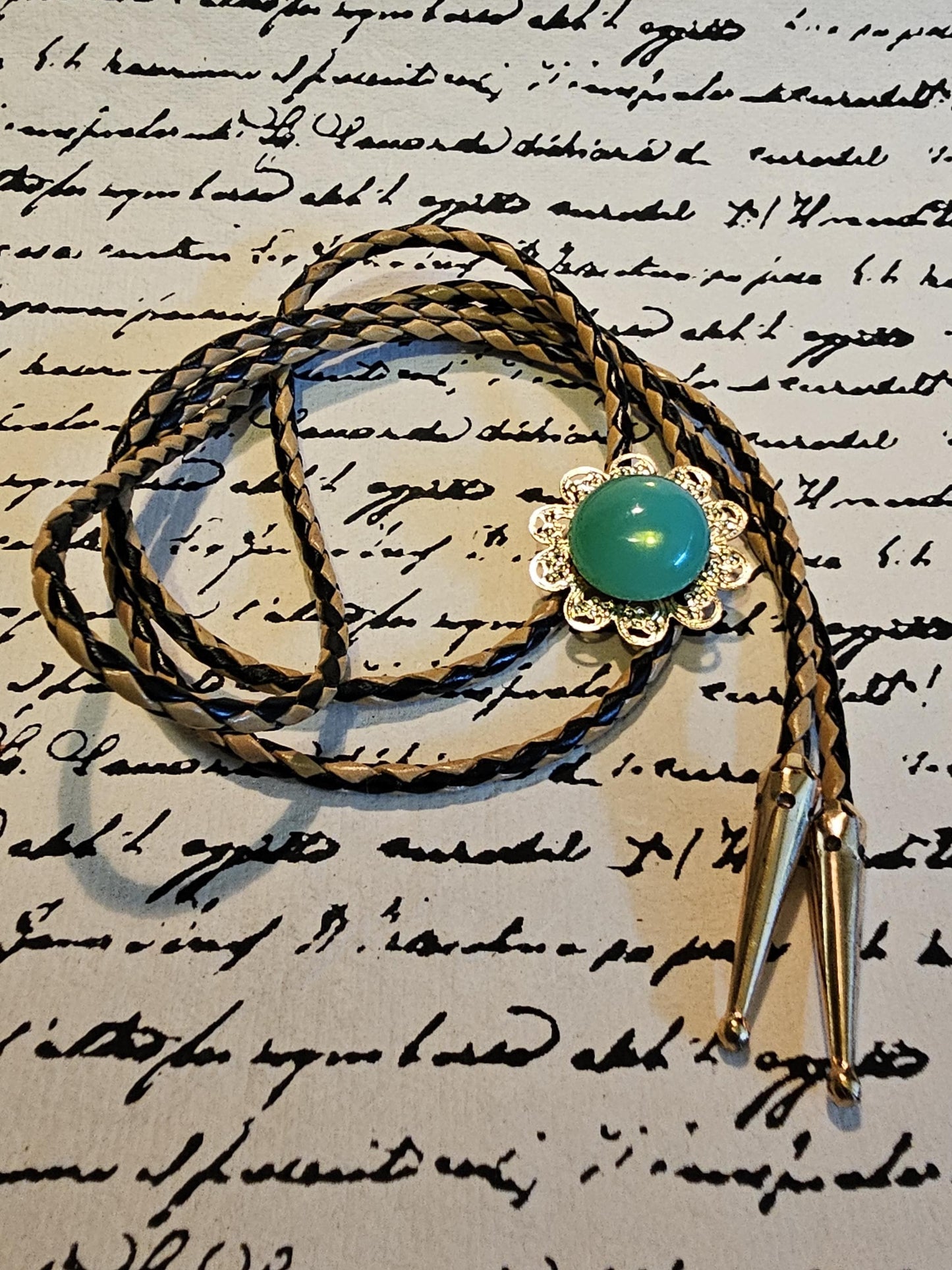 Uranium Glass Bolo Tie Gold color w/ Green 18 mm Round cut Round top Cabochon cut vintage Uranium Glass stone that glows under black/UV ligh