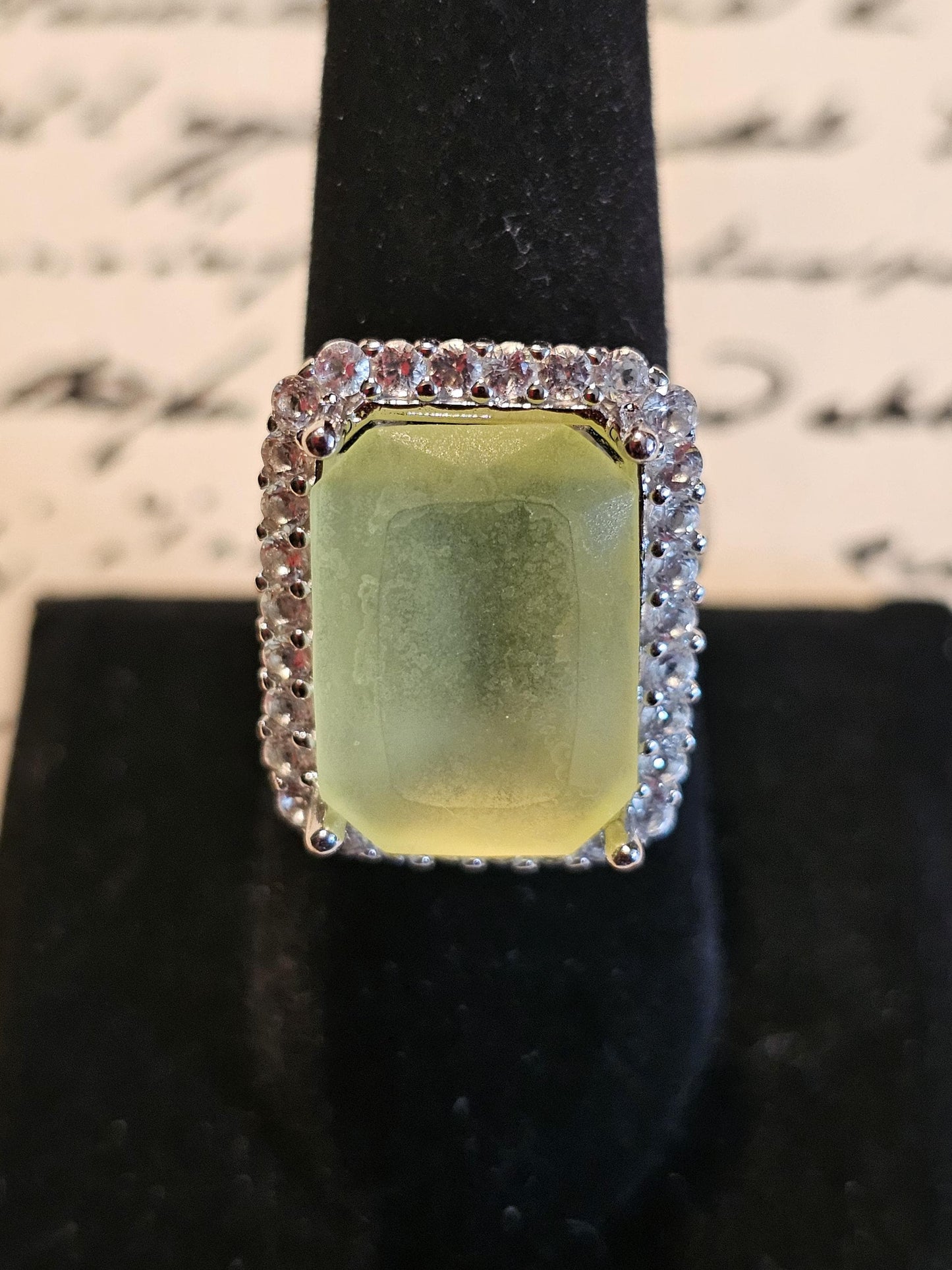 Uranium Glass Emerald cut Halo style ring in size 7, new Sterling Silver with vintage Uranium glass stone that glows under black / UV light