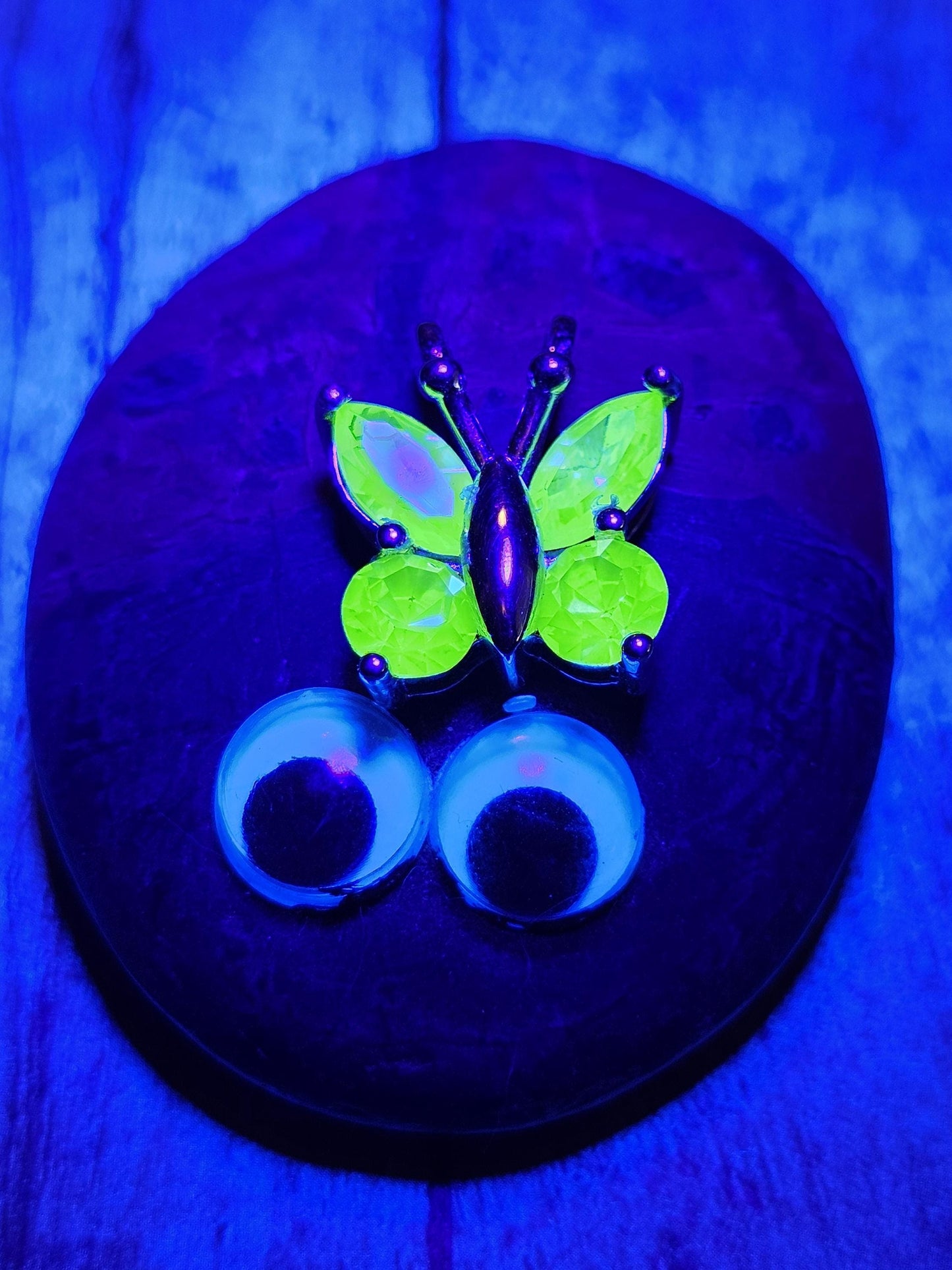 Uranium Glass Pendant in new Sterling Silver Butterfly design with Vintage Uranium Glass stones that glow under black / UV light