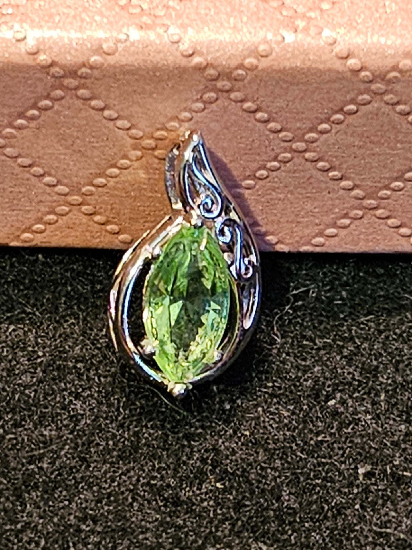 Uranium Glass Pendant in Sterling Silver with a vintage Marquee cut Uranium Glass stone glows under black / UV light