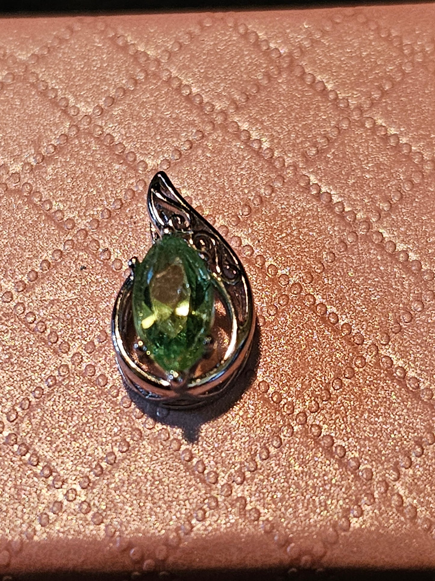 Uranium Glass Pendant in Sterling Silver with a vintage Marquee cut Uranium Glass stone glows under black / UV light