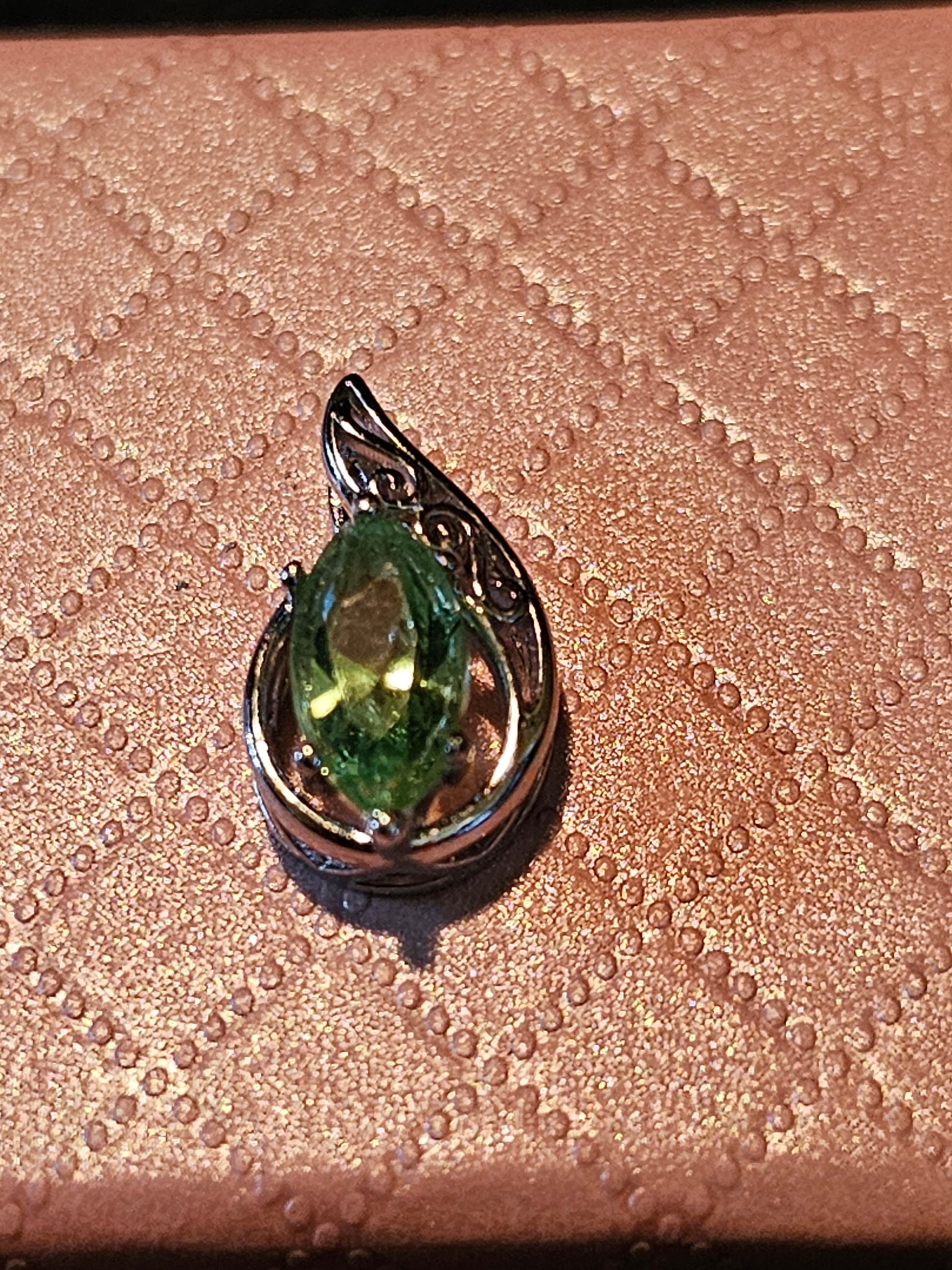 Uranium Glass Pendant in Sterling Silver with a vintage Marquee cut Uranium Glass stone glows under black / UV light