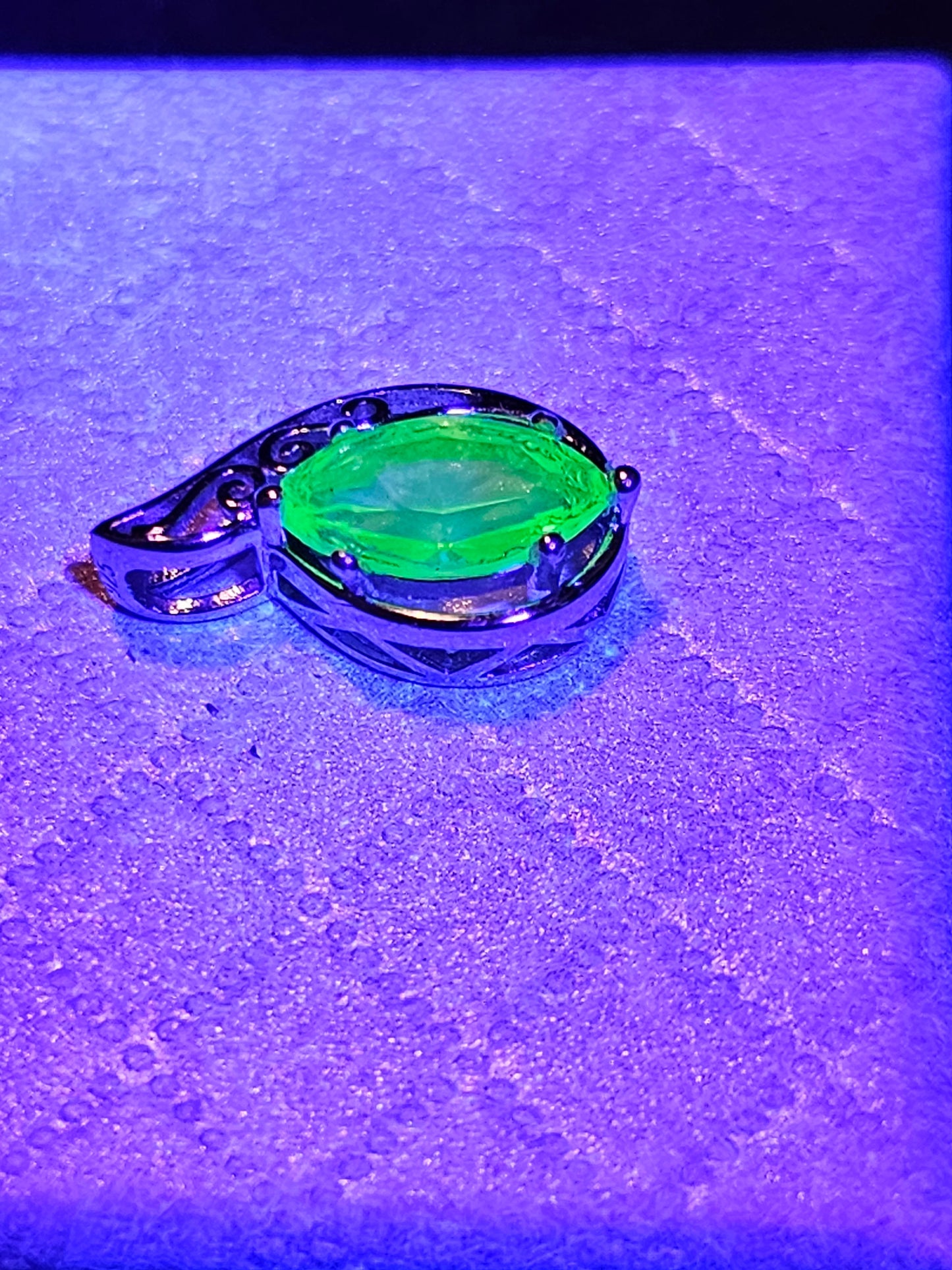 Uranium Glass Pendant in Sterling Silver with a vintage Marquee cut Uranium Glass stone glows under black / UV light