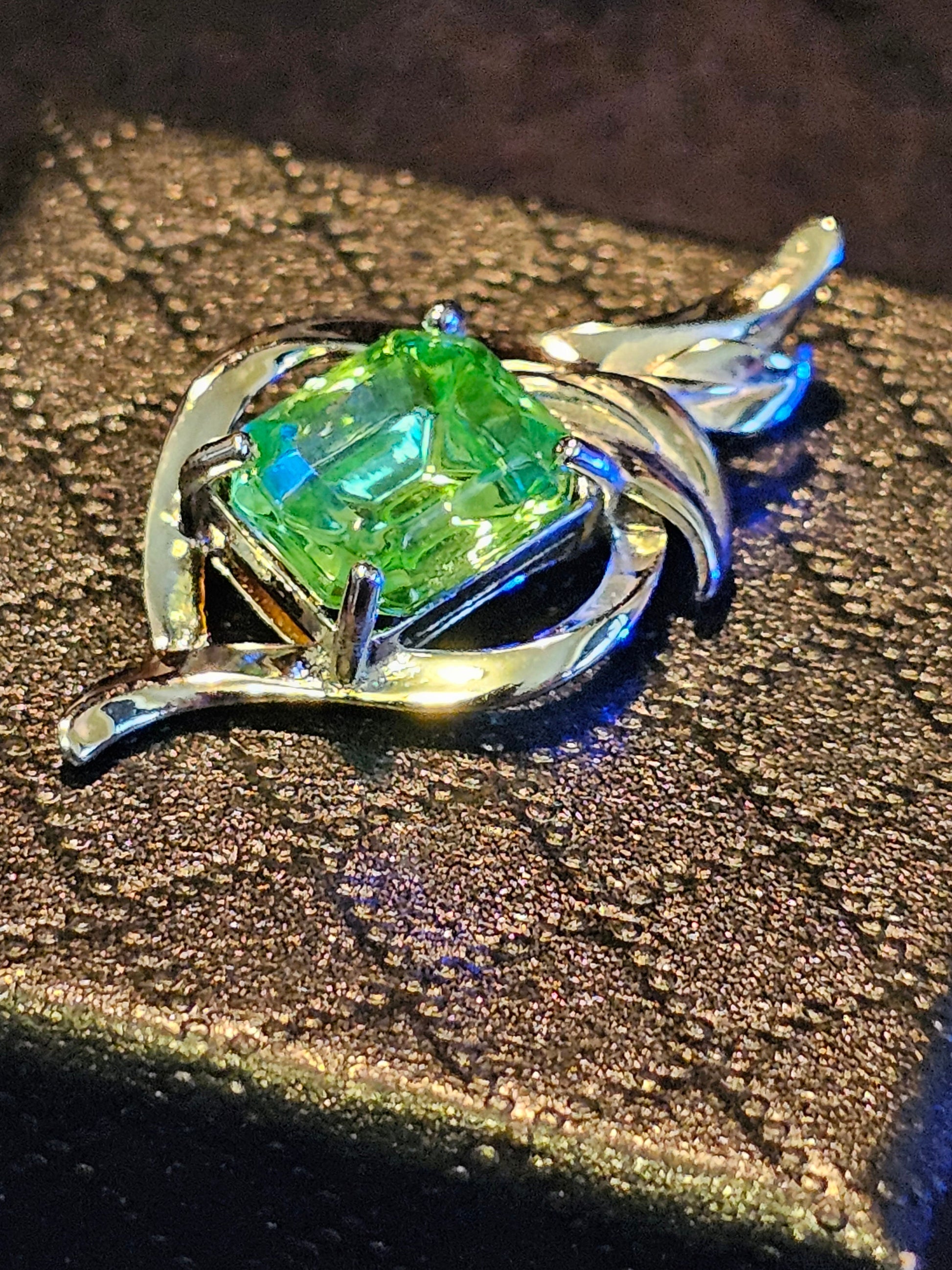 Uranium Glass Pendant in new Sterling Silver with a vintage Emerald cut Uranium Glass stone glows under black / UV light