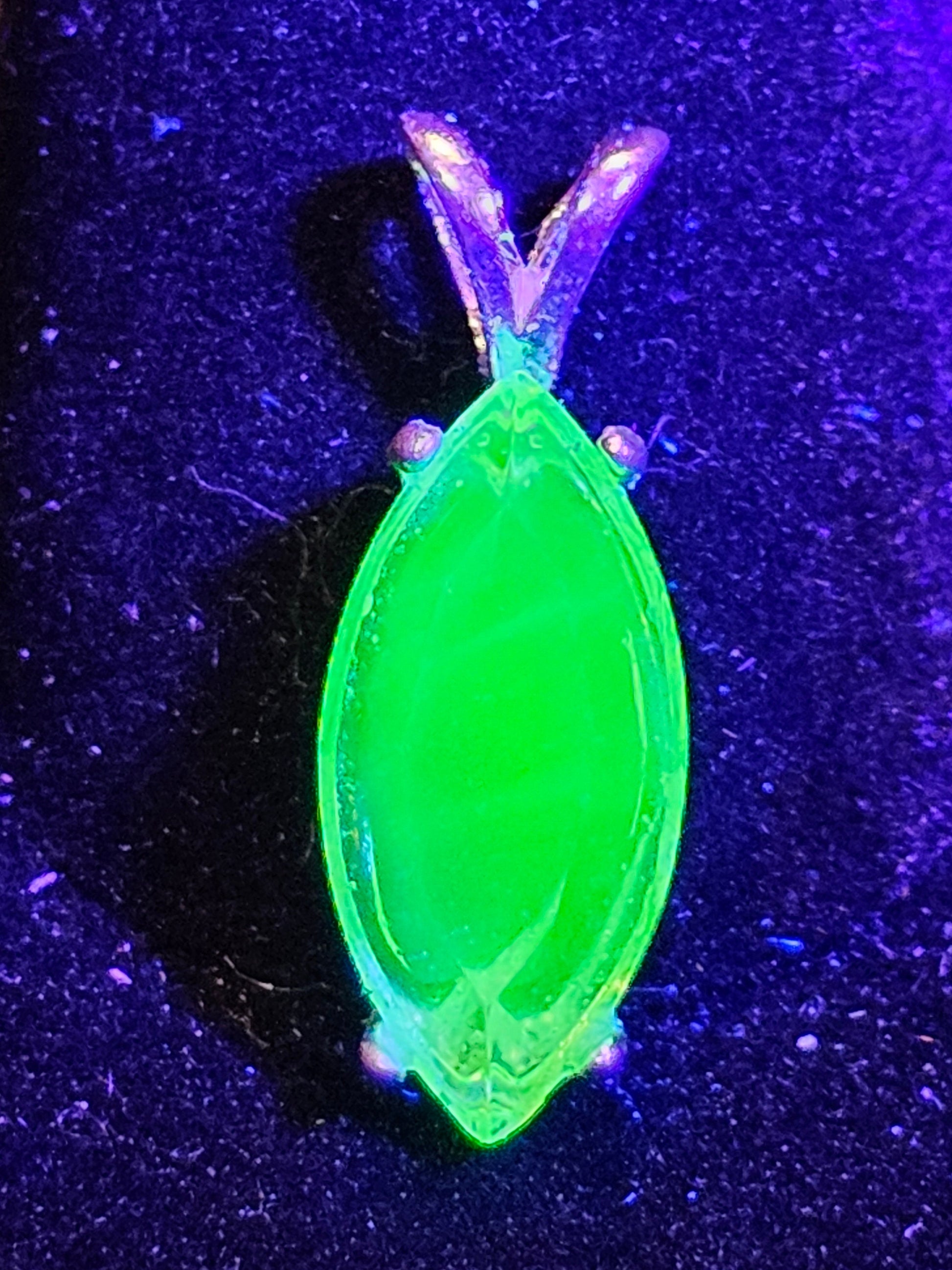 Uranium Glass Pendant in Sterling Silver with a vintage Marquee cut Uranium Glass stone glows under black / UV light