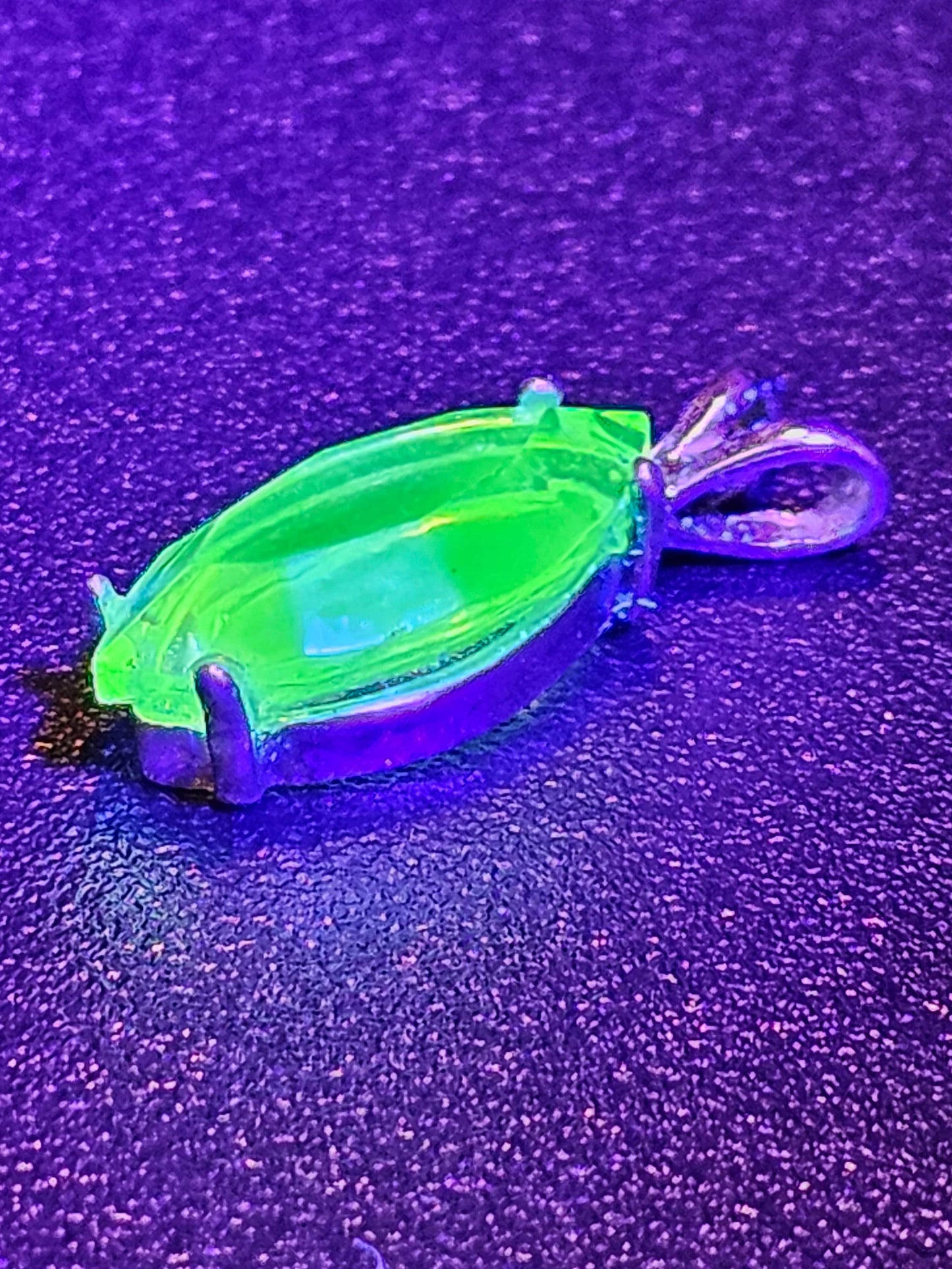 Uranium Glass Pendant in Sterling Silver with a vintage Marquee cut Uranium Glass stone glows under black / UV light