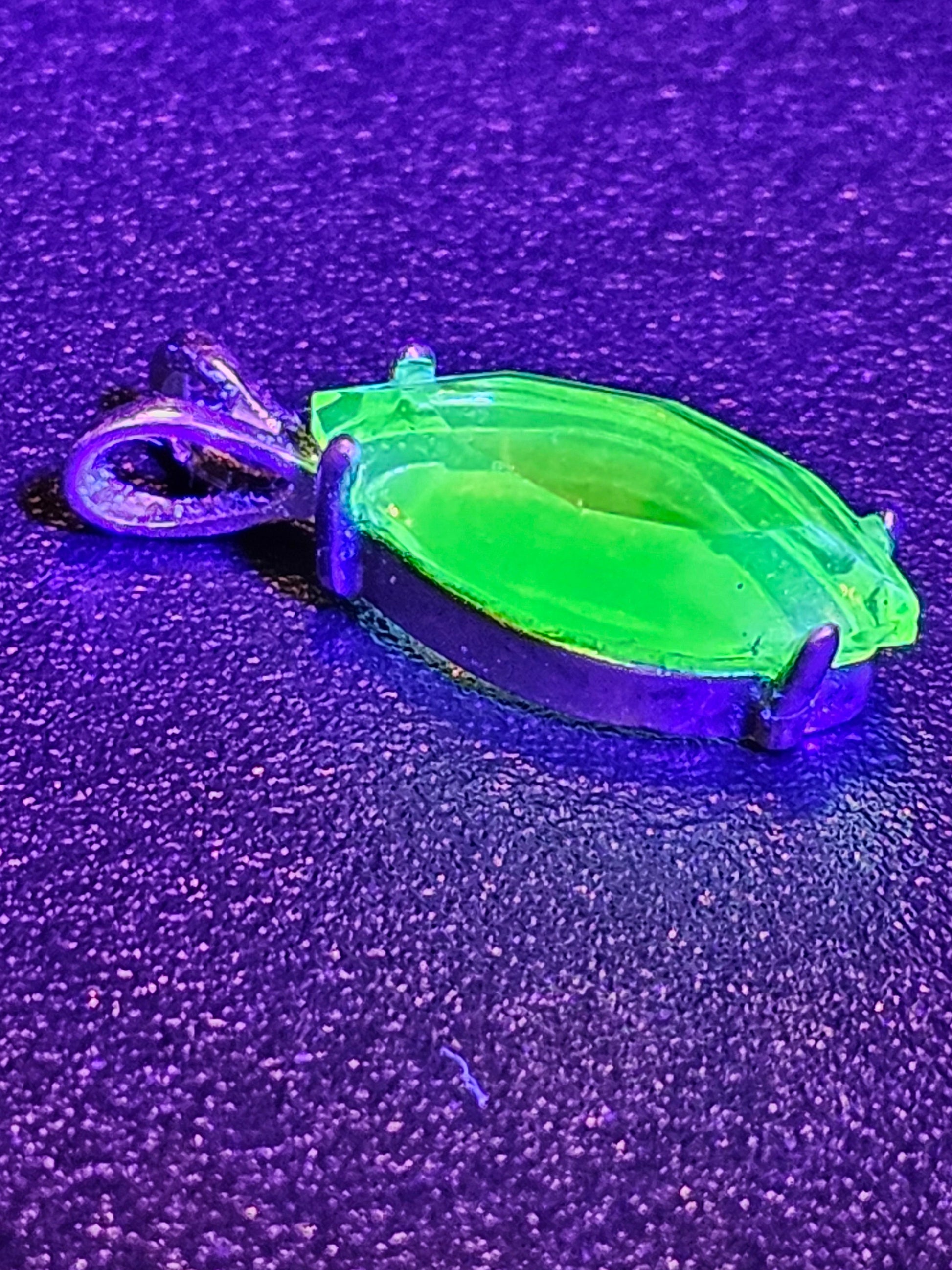 Uranium Glass Pendant in Sterling Silver with a vintage Marquee cut Uranium Glass stone glows under black / UV light