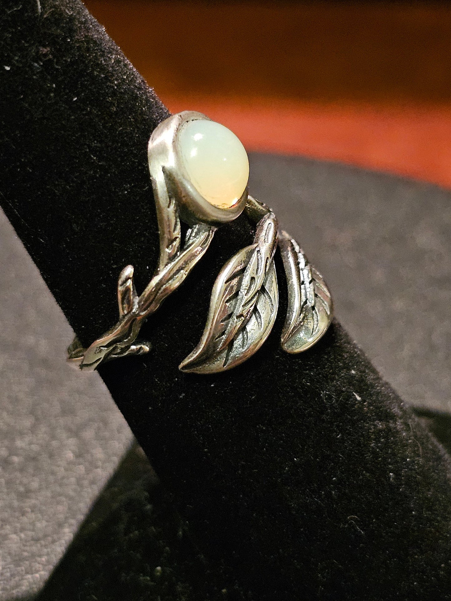 Uranium Glass Adjustable Ring in Sterling Silver Leaf and Branch design with vintage Uranium glass round stone glows under black / UV light