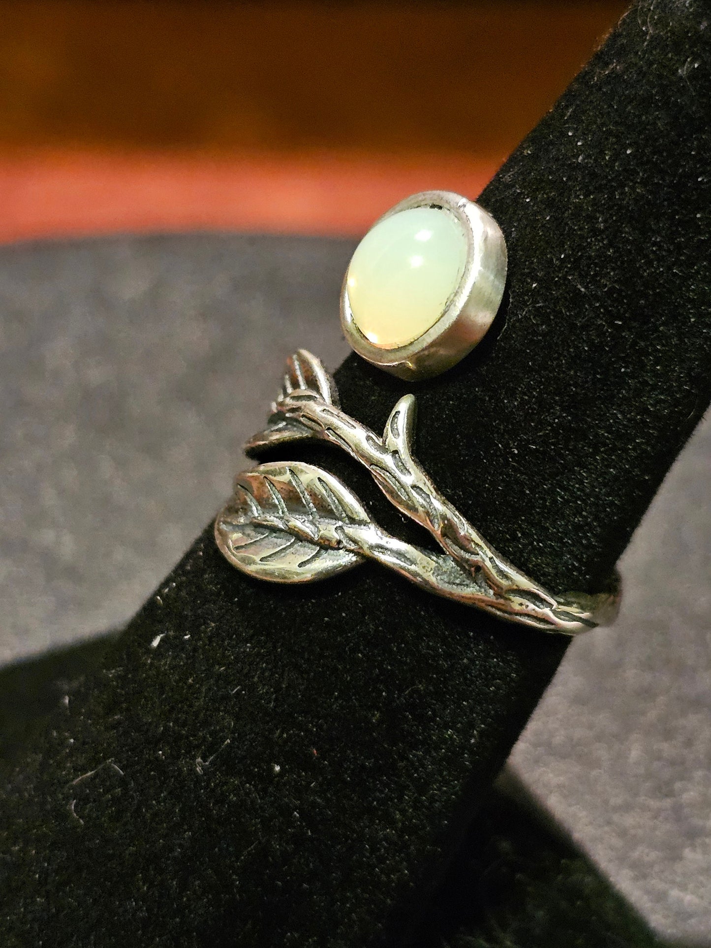 Uranium Glass Adjustable Ring in Sterling Silver Leaf and Branch design with vintage Uranium glass round stone glows under black / UV light