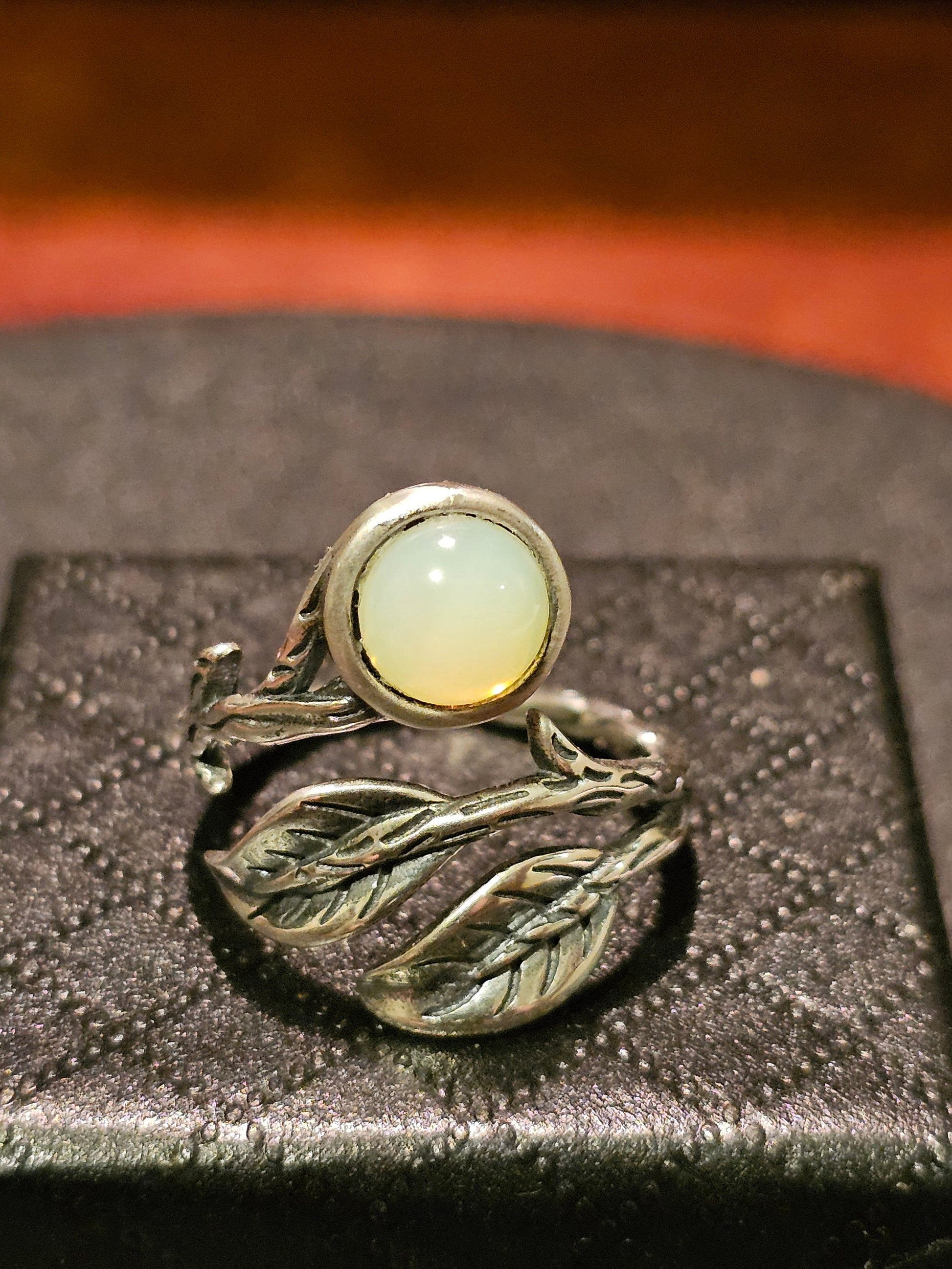 Uranium Glass Adjustable Ring in Sterling Silver Leaf and Branch design with vintage Uranium glass round stone glows under black / UV light