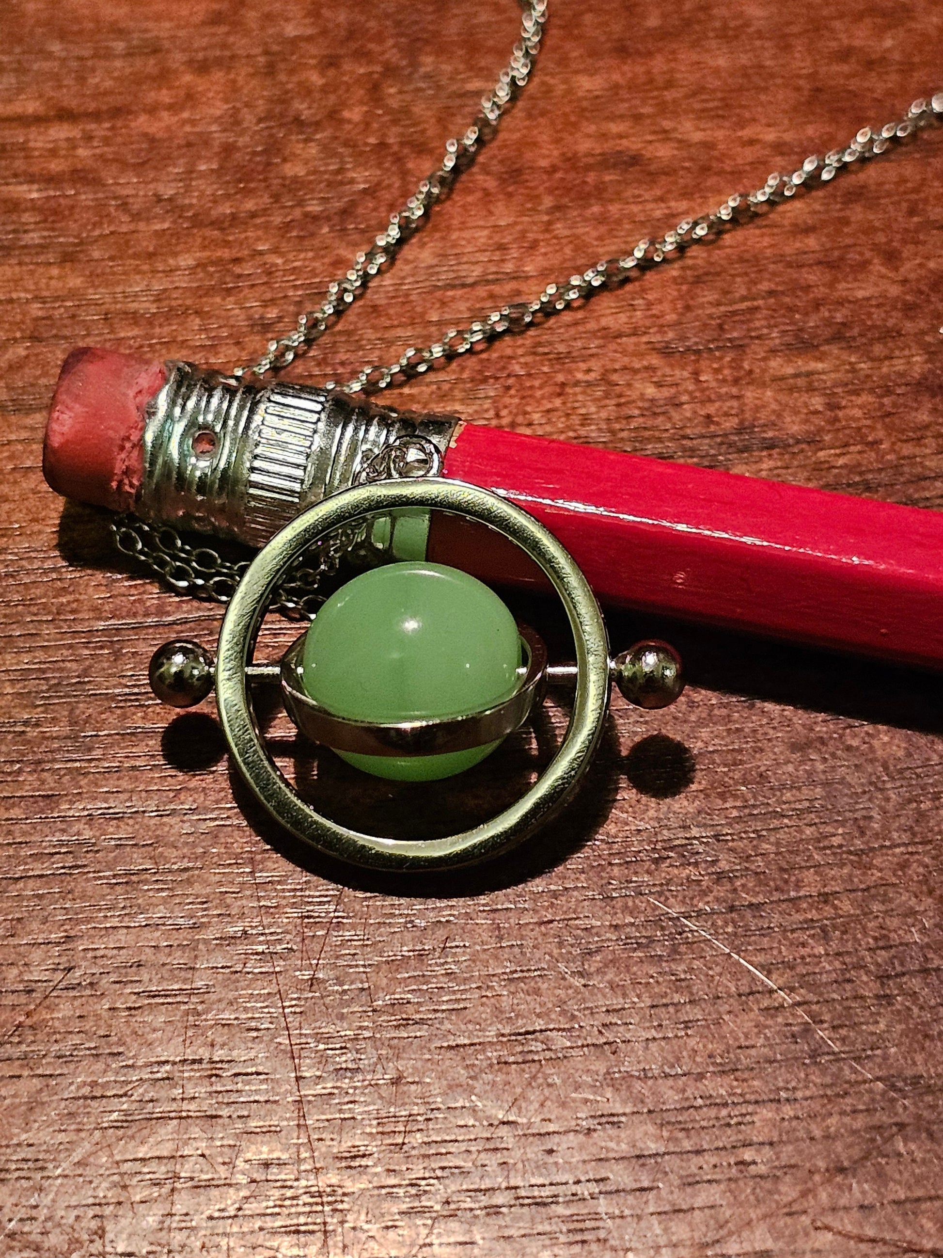 Uranium Glass Pendant with chain in new Sterling Silver with a vintage 9 mm round Uranium Glass bead that glows under black / UV light
