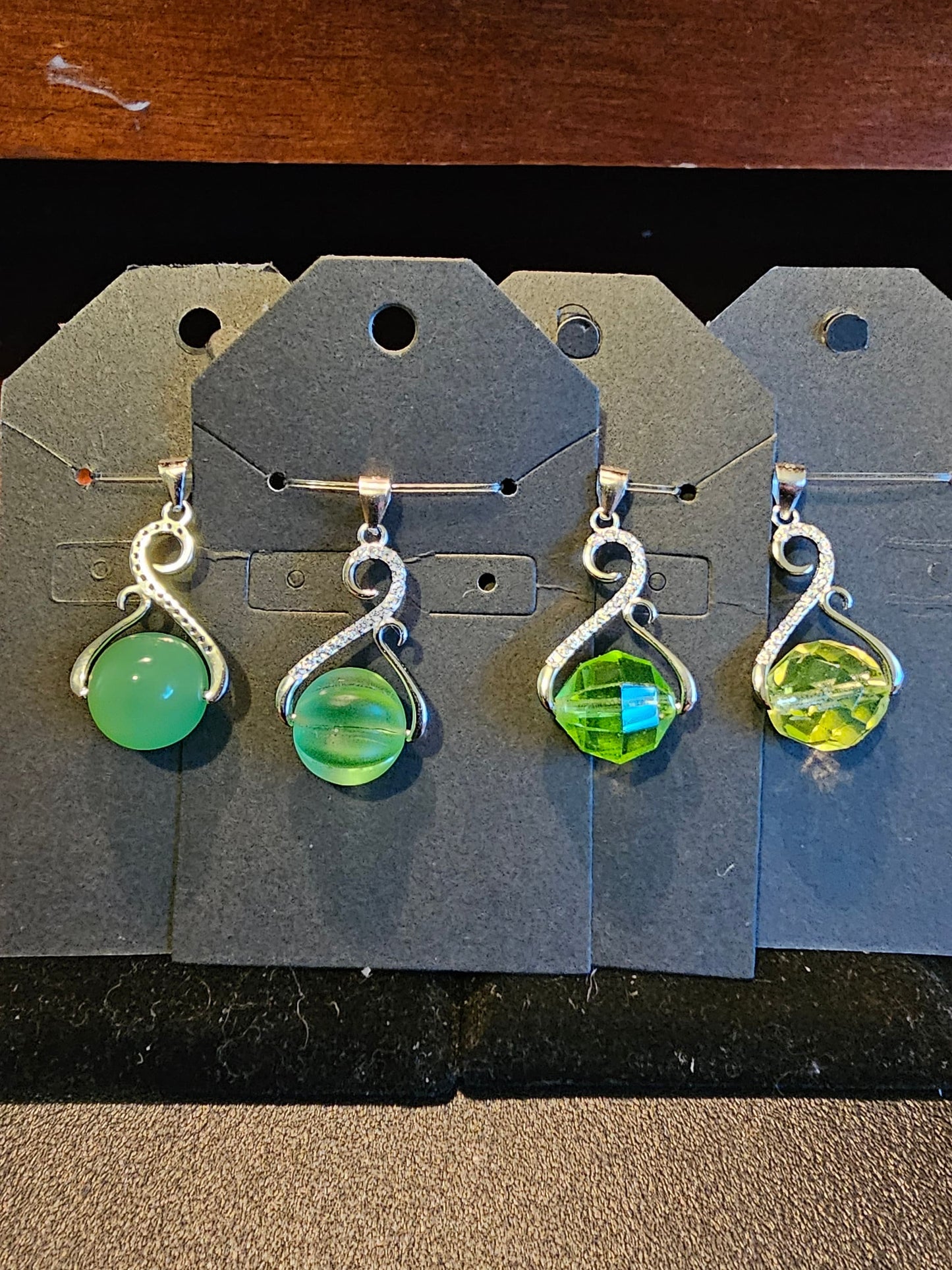 Uranium Glass Pendant in new Sterling Silver with a vintage 12 mm round Uranium Glass bead that glows under black / UV light